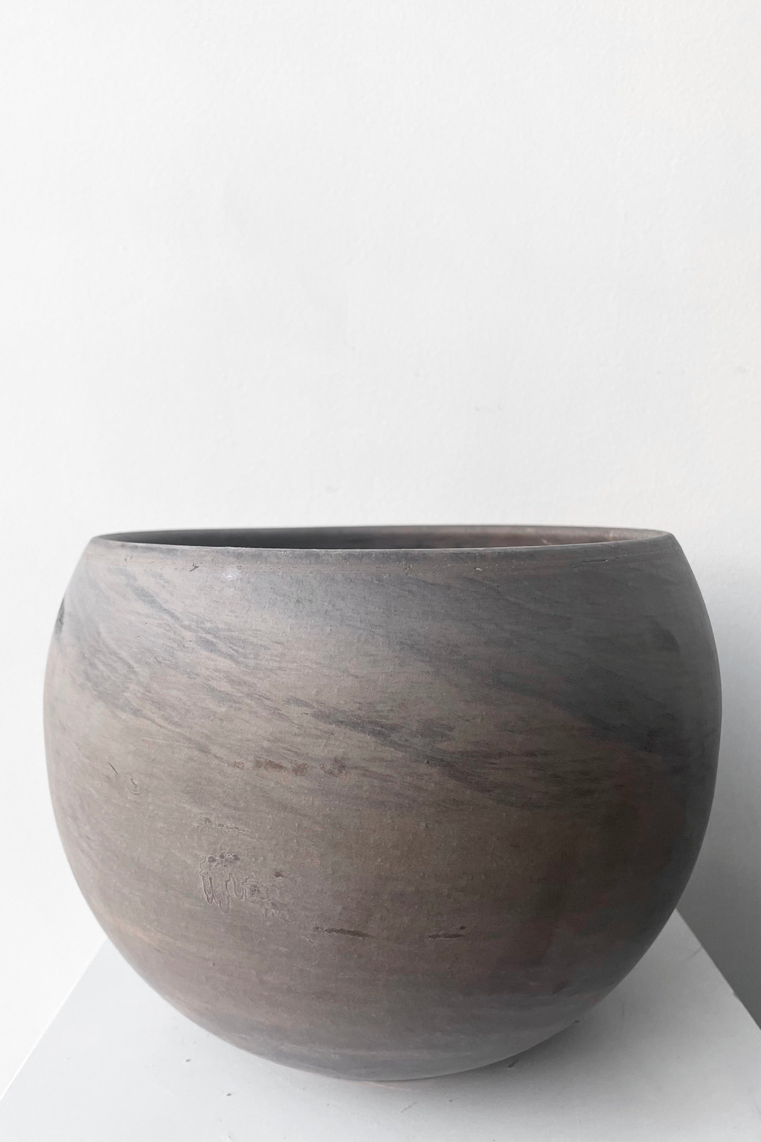 A frontal vie of Luna Sphere Pot basalt 9" against white backdrop