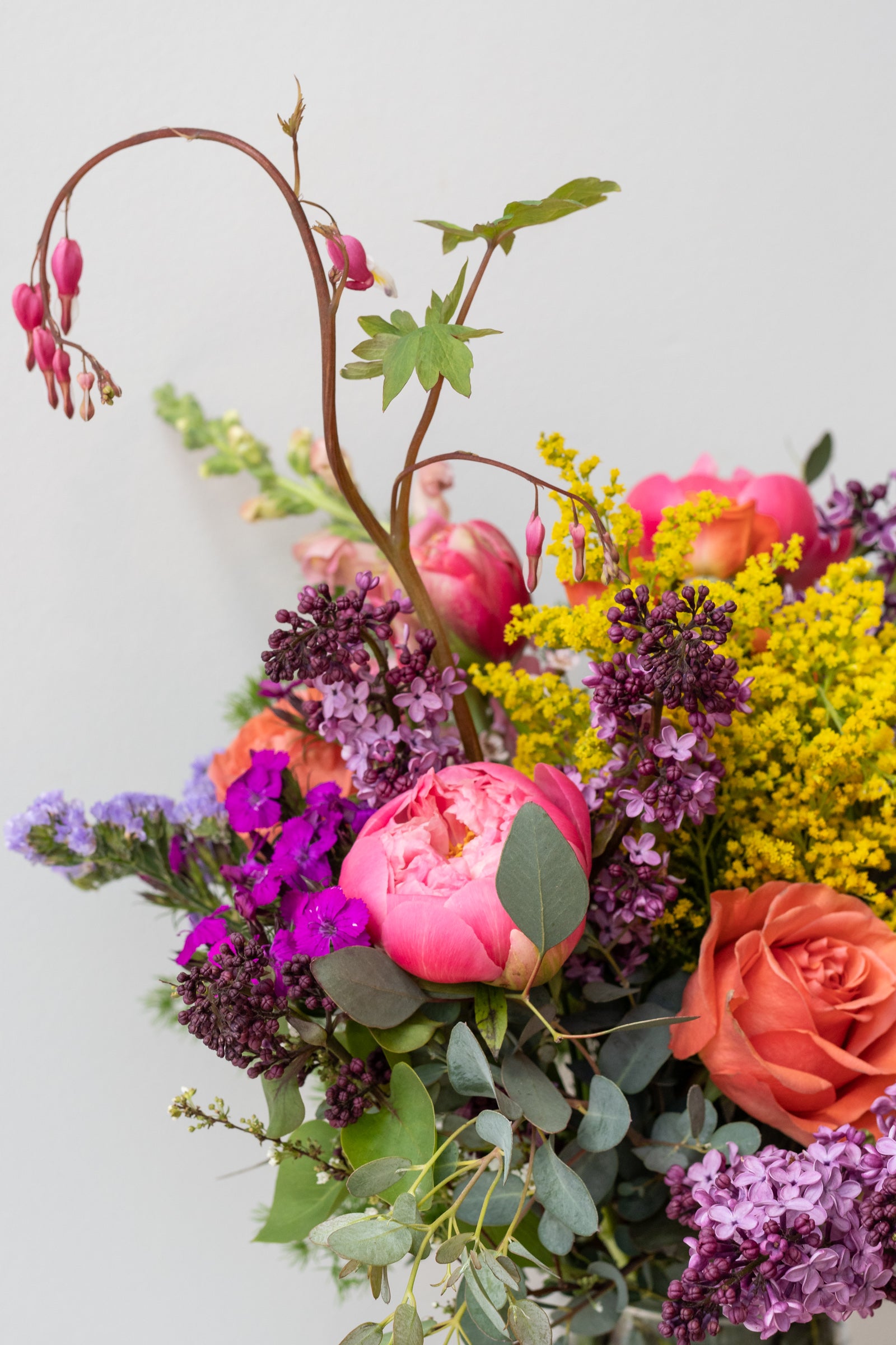 An example of Floral Arrangement Midday with bleeding heart and lilac from Sprout Home in Chicago ©Sprout Home #size_$160