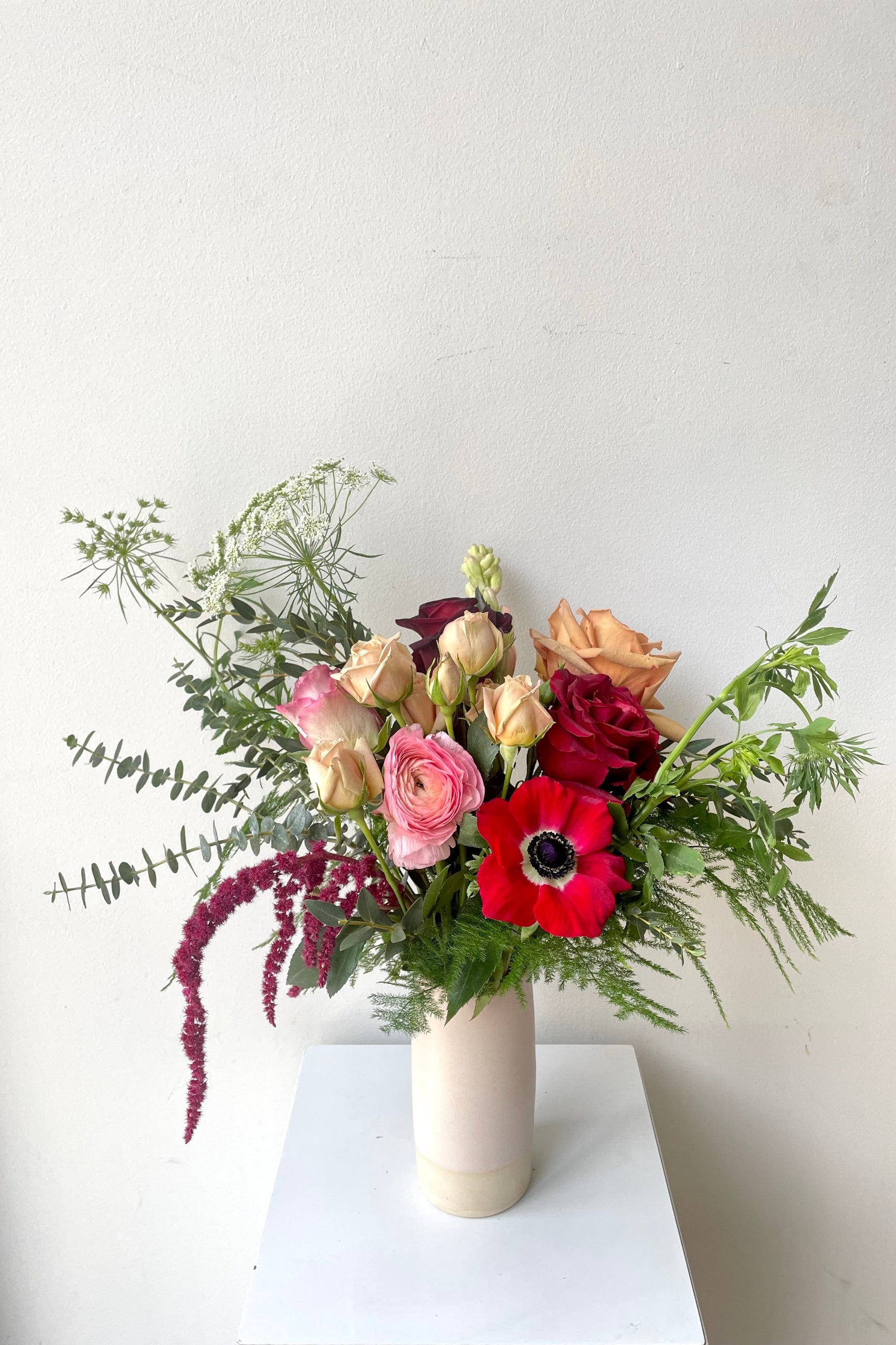 A vase holds an example of fresh Floral Arrangement Modern Love $65 from Sprout Home Floral in Chicago for Valentine's Day ©Sprout Home #size_$75