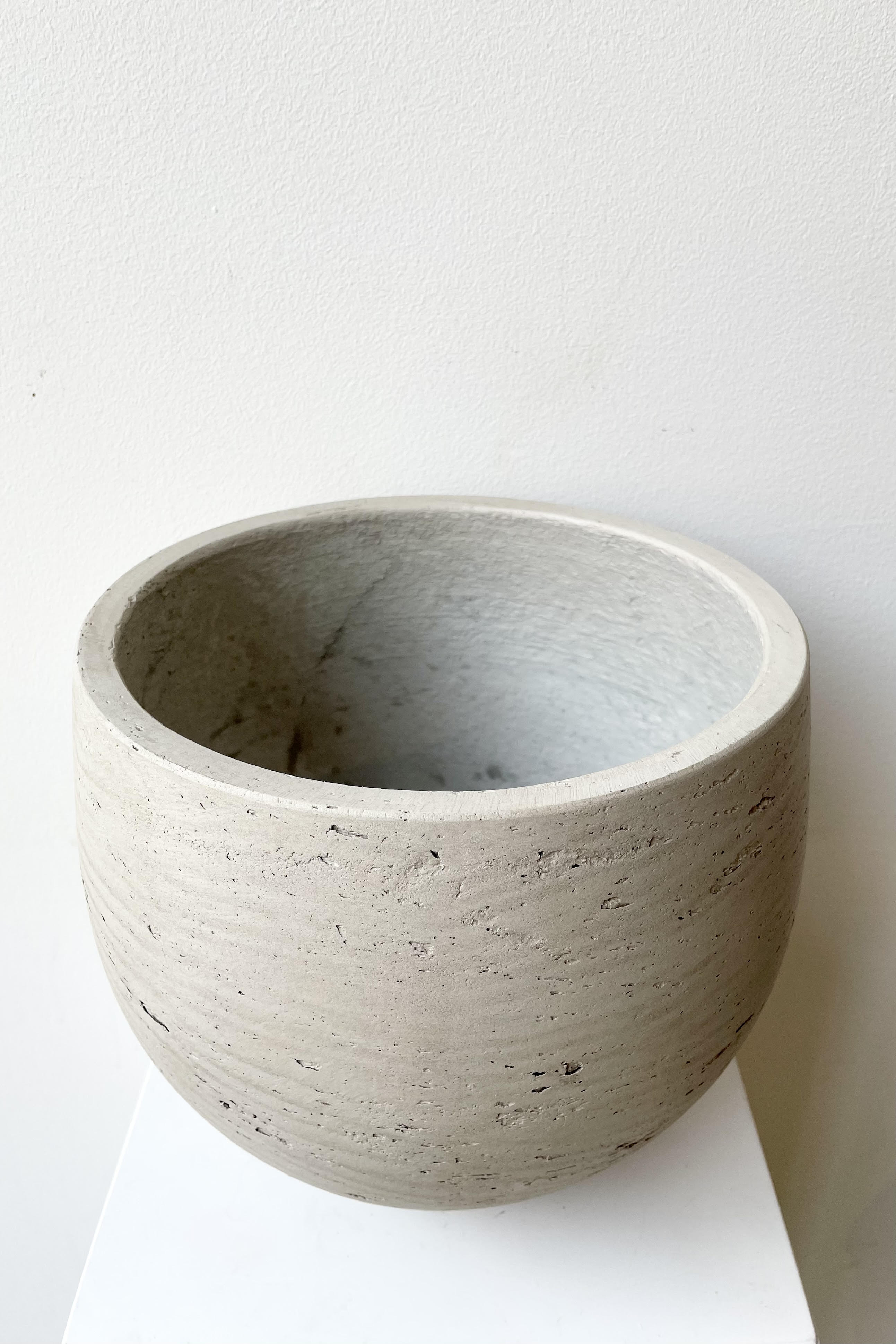 An aerial view of the Mini Orb grey washed medium pot.