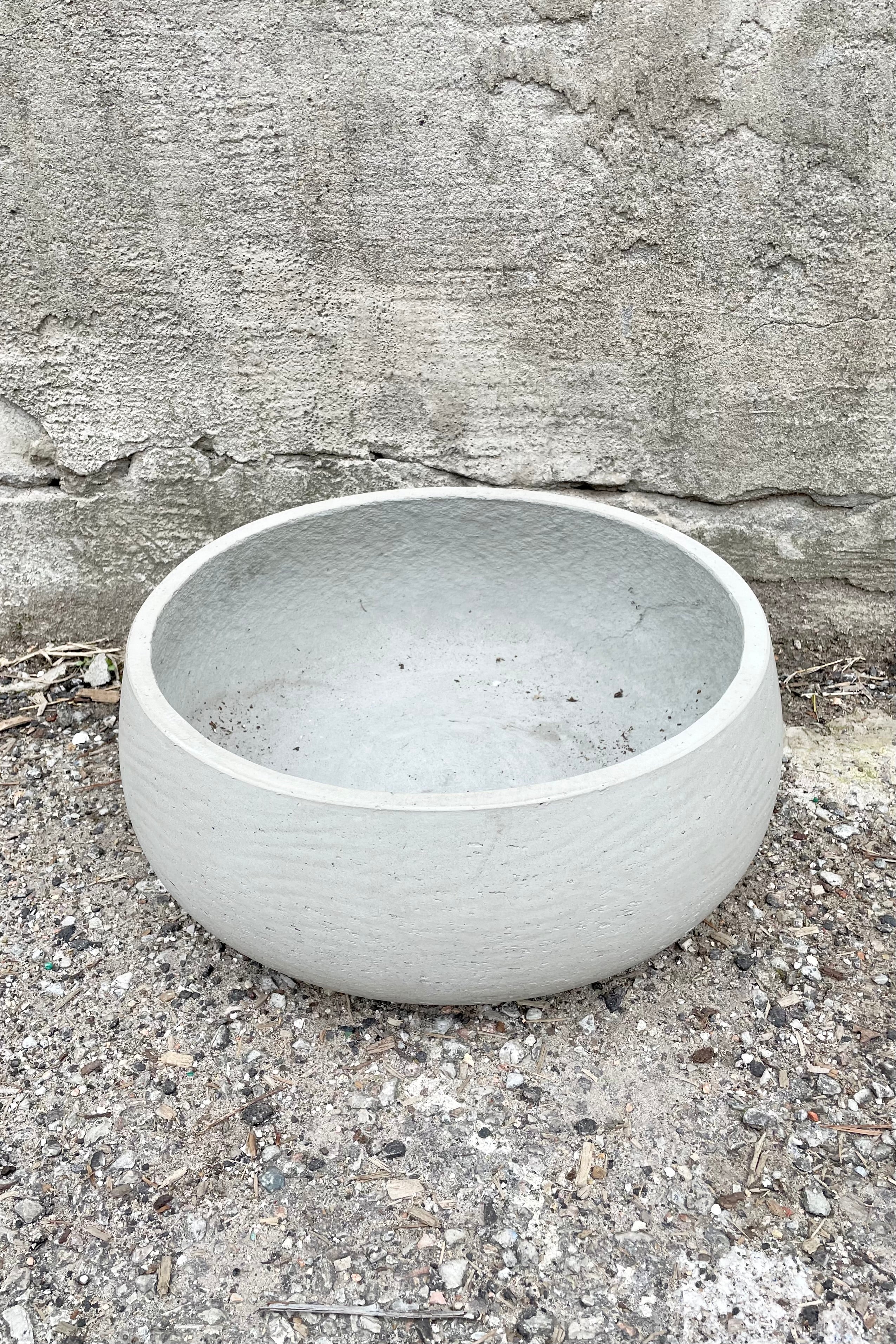 Detail of Eileen Pot grey washed large against a grey wall