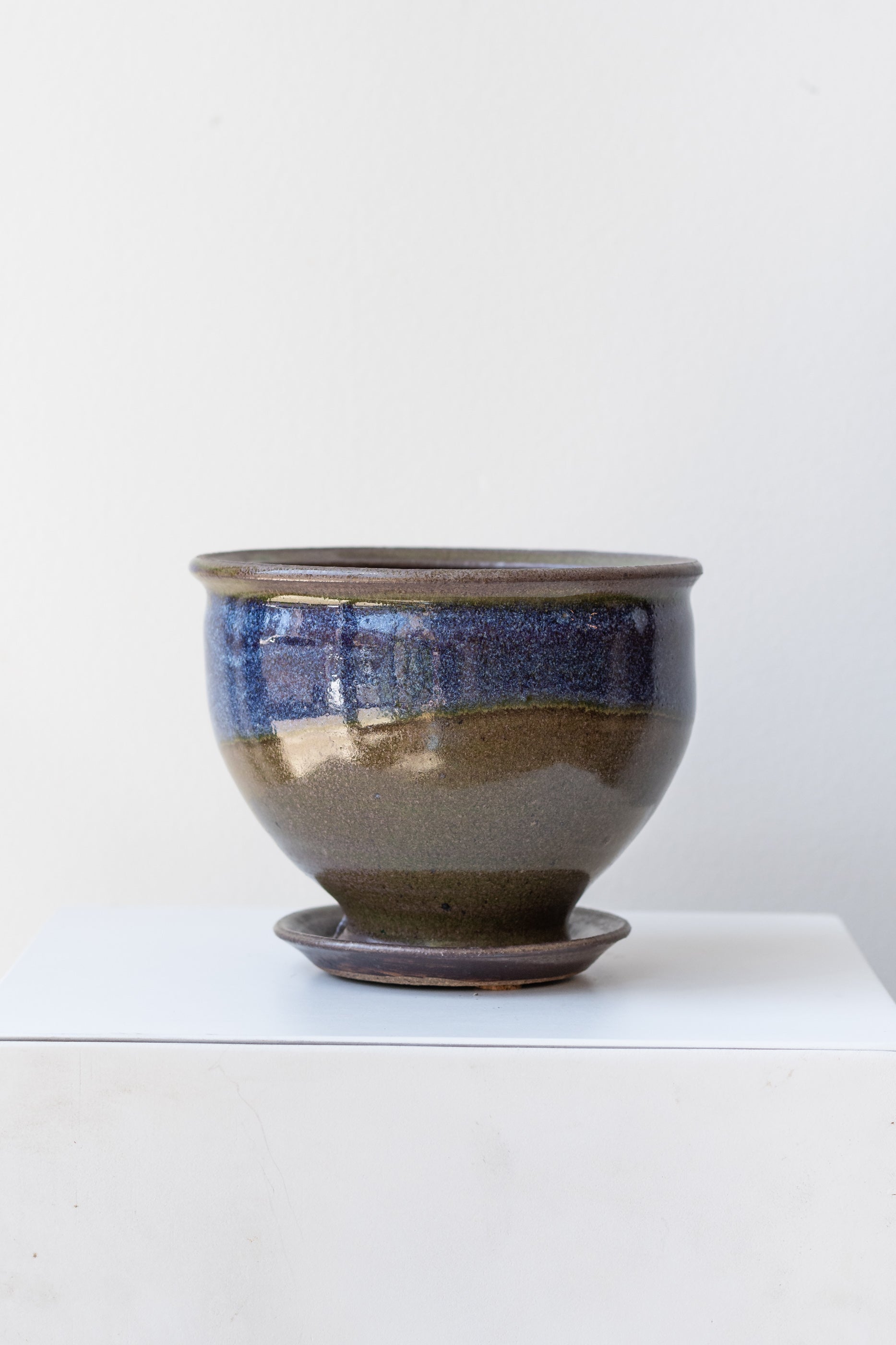Bruning Pottery Planter moss & lilac glaze - 4" on a white surface in a white room