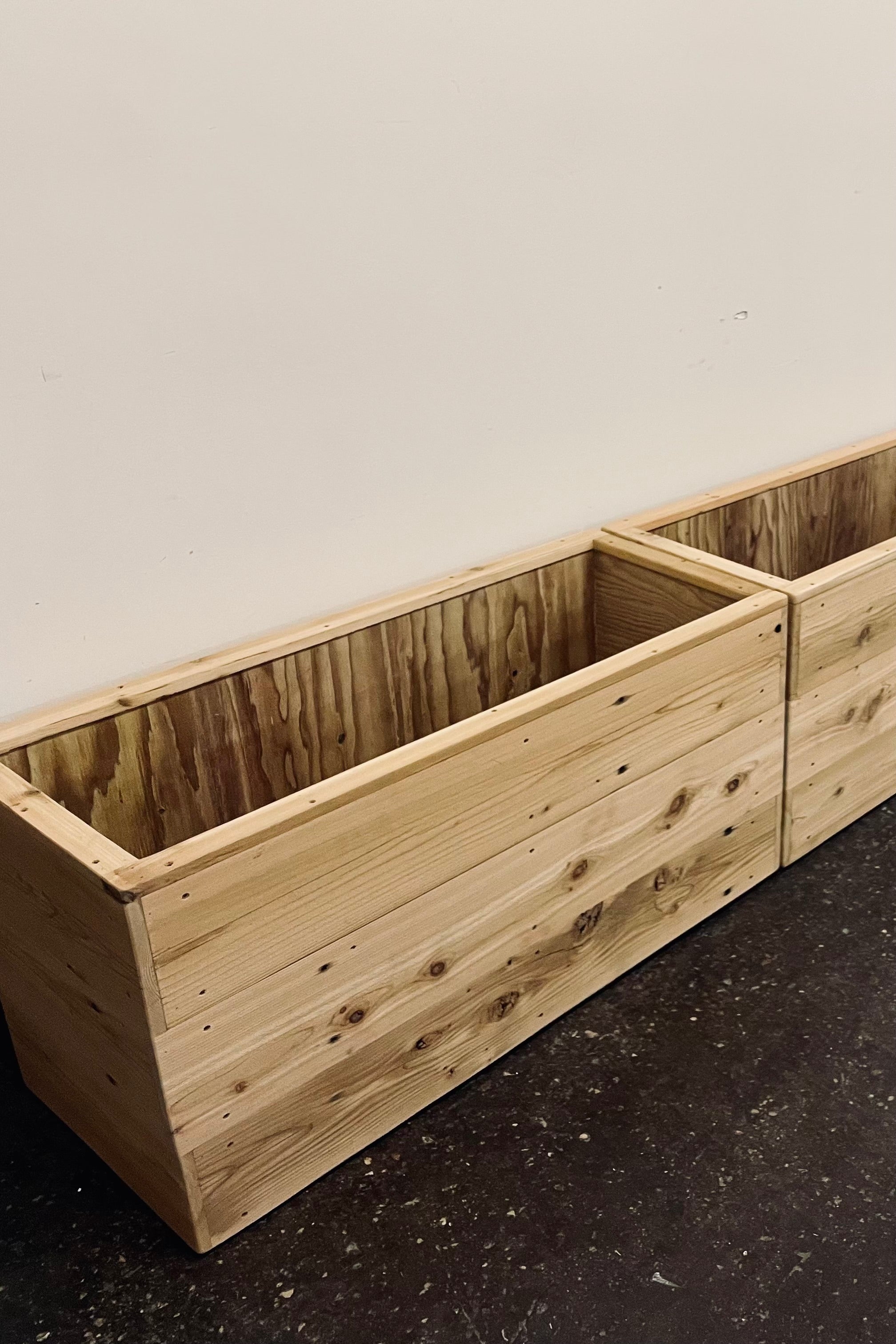 Handmade cedar 42" rectangular planter at Sprout Home shown empty.