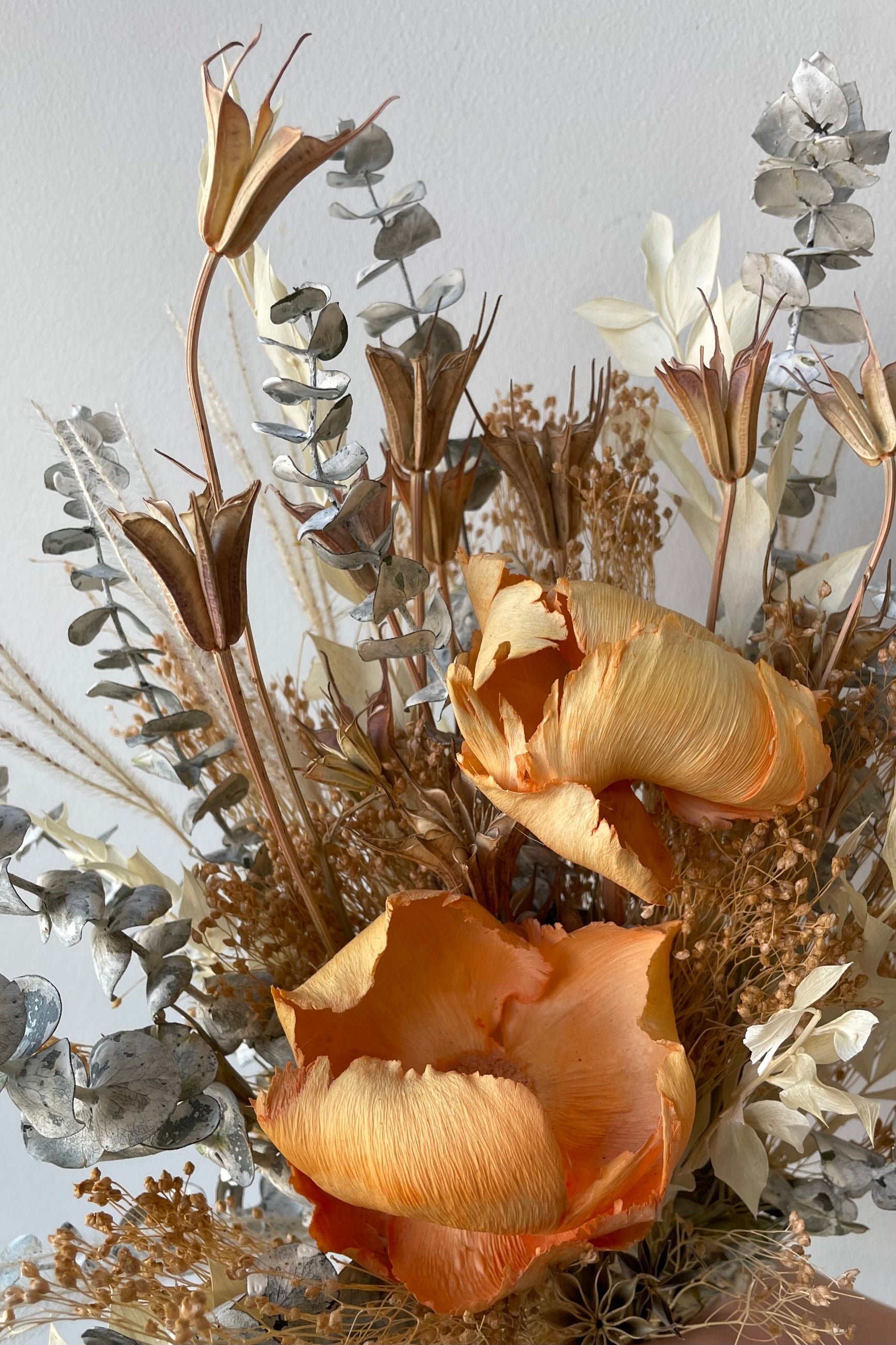 A close-up view of the $60 version of Preserved Arrangement Creamsicle by Sprout Home ©Sprout Home #size_$60