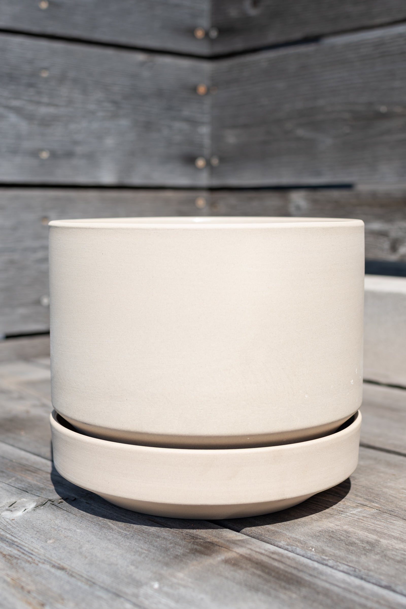 Round Pot & Saucer oatmeal 8" by LBE Designs in front of grey wood background