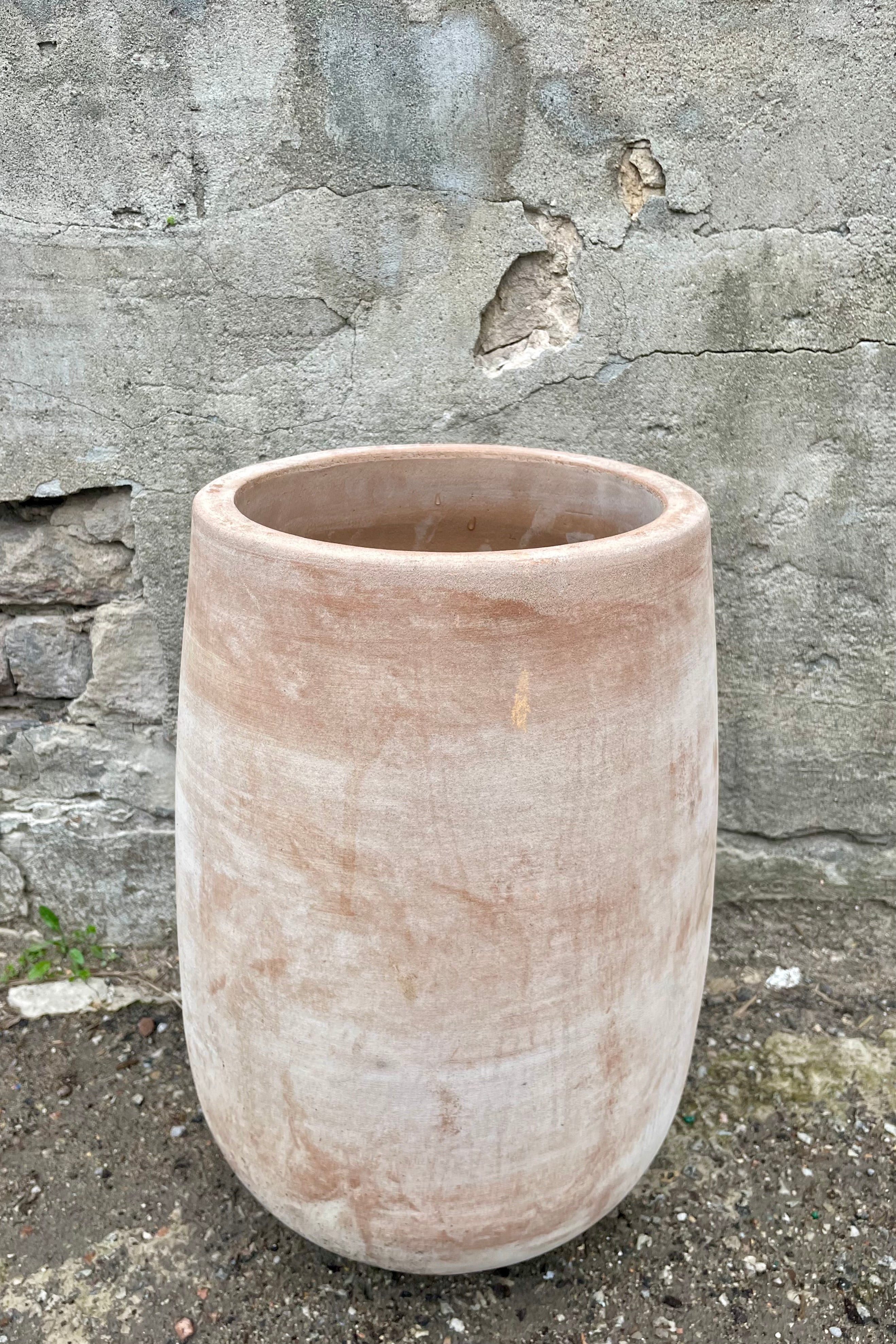 detail of the top of Yumiko Unglazed Crucible Small against a grey wall