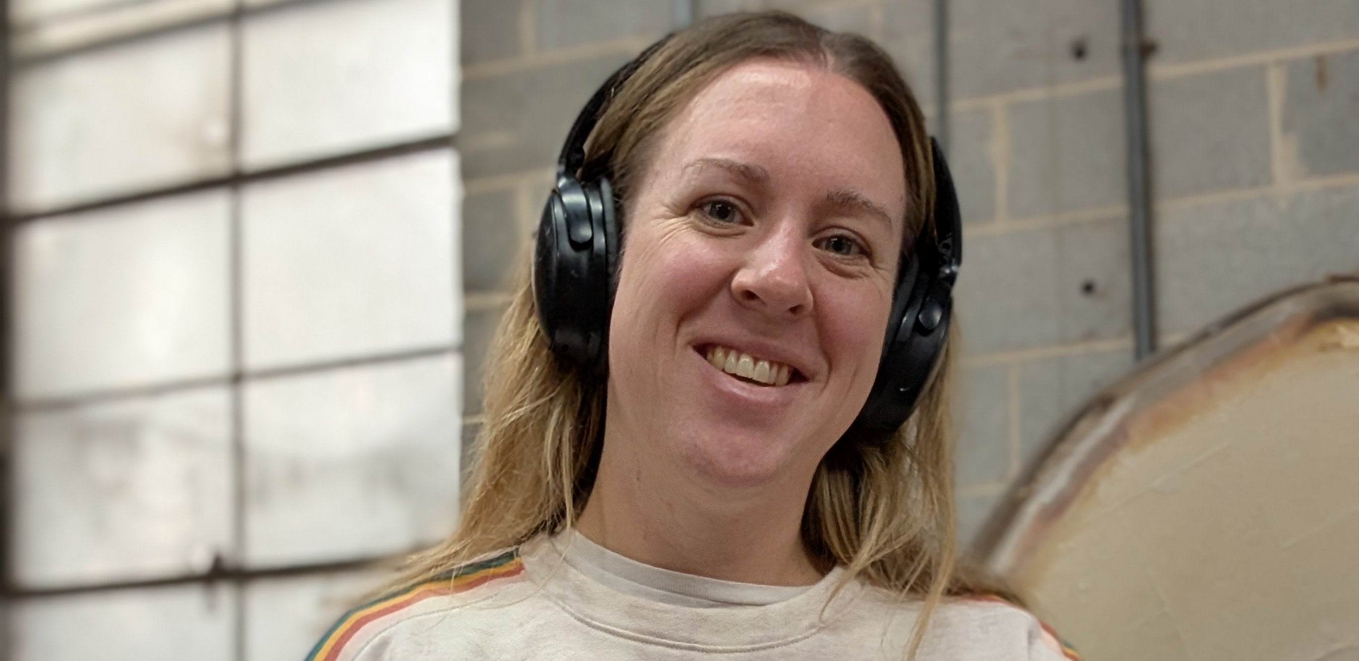 Christina Kosinski portrait with headphones in her studio ©Kristina Kosinski