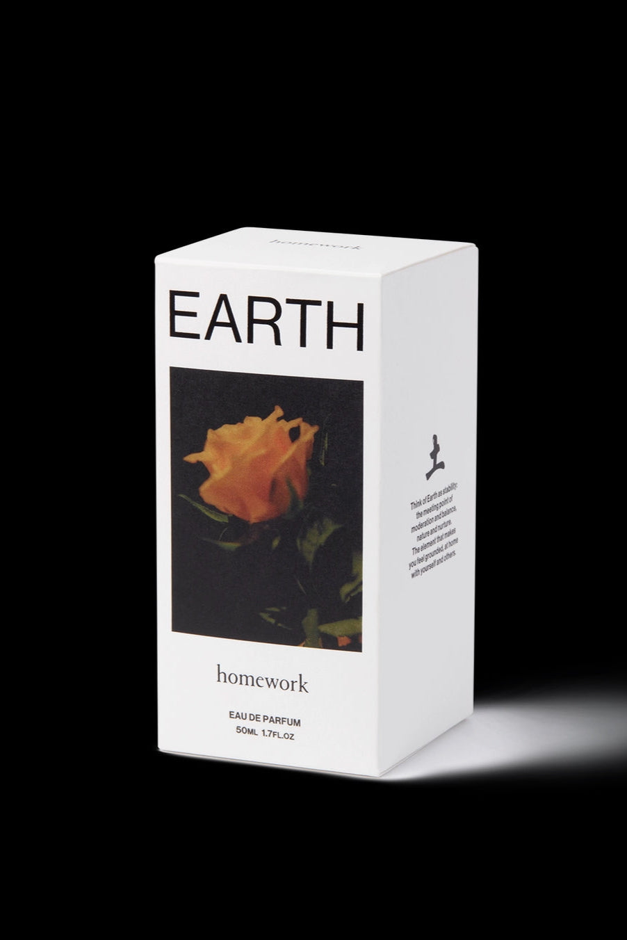 Earth Eau de Parfum White box with 'EARTH' and 'homework' text, featuring a rose image on a black background. ©Homework