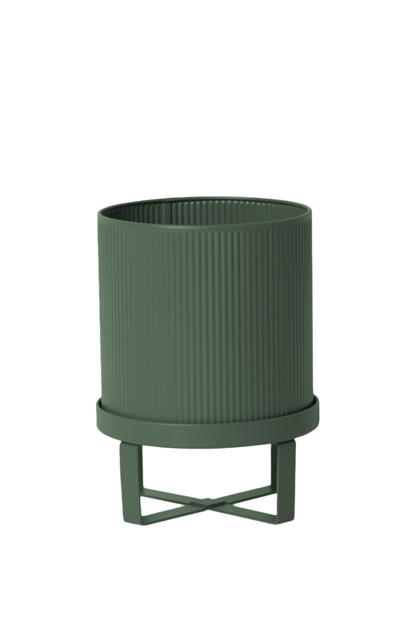 Green small Bau Pot by Ferm Living showing the vertical ridges on the side.