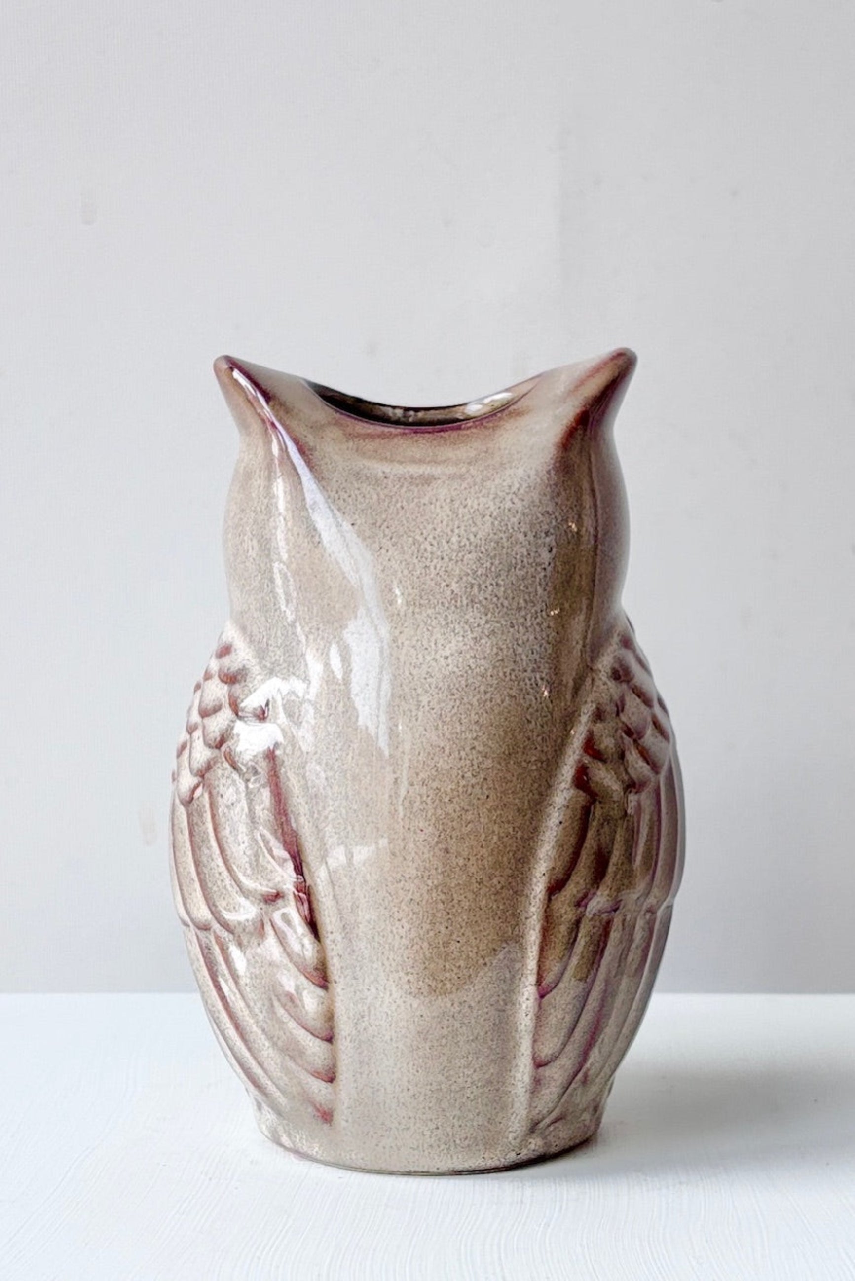 Back side of ceramic owl-shaped vase on a white background ©Sprout Home