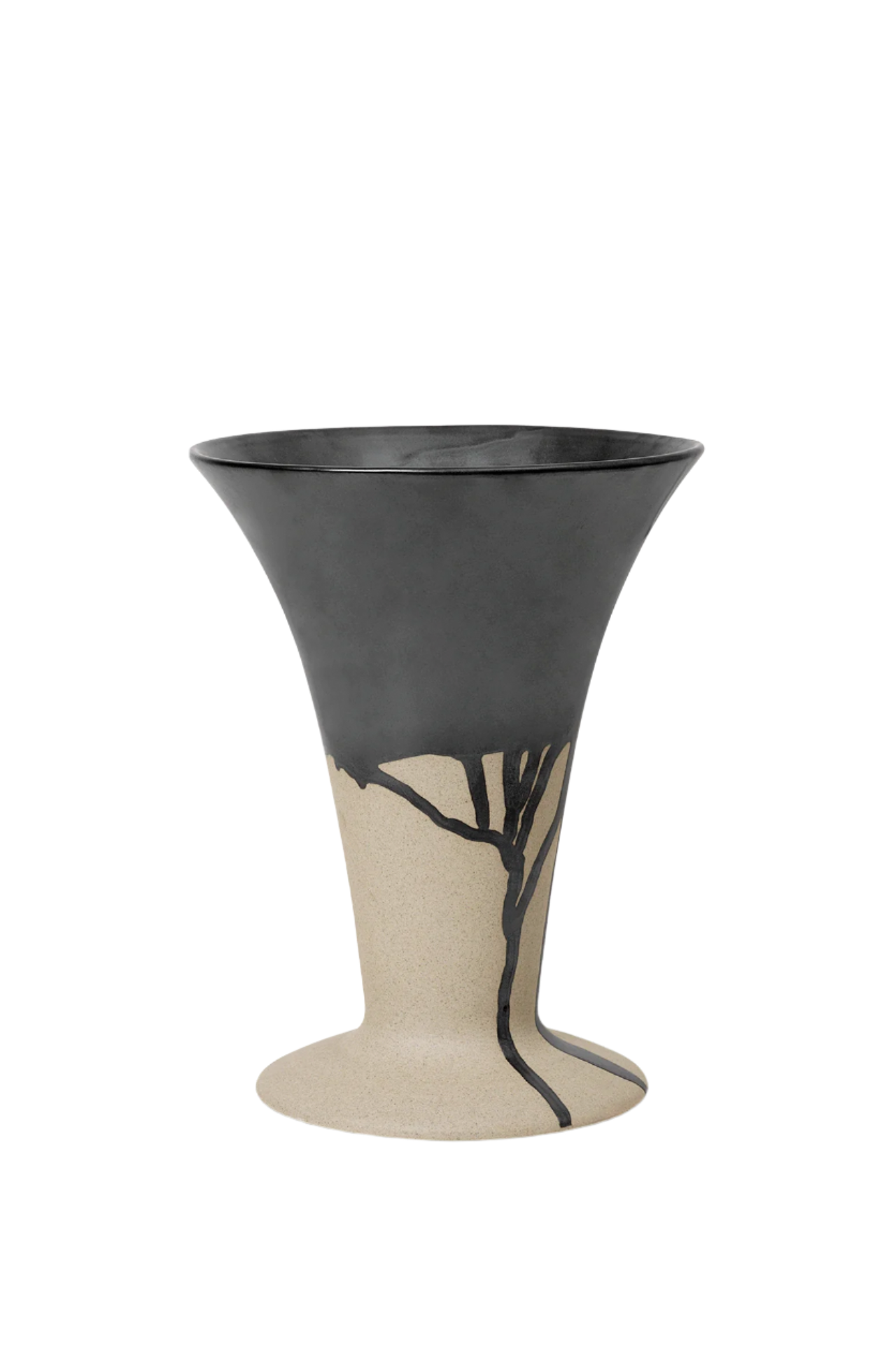 The Flores vase with its sand colored ceramic and darker black drip glaze.