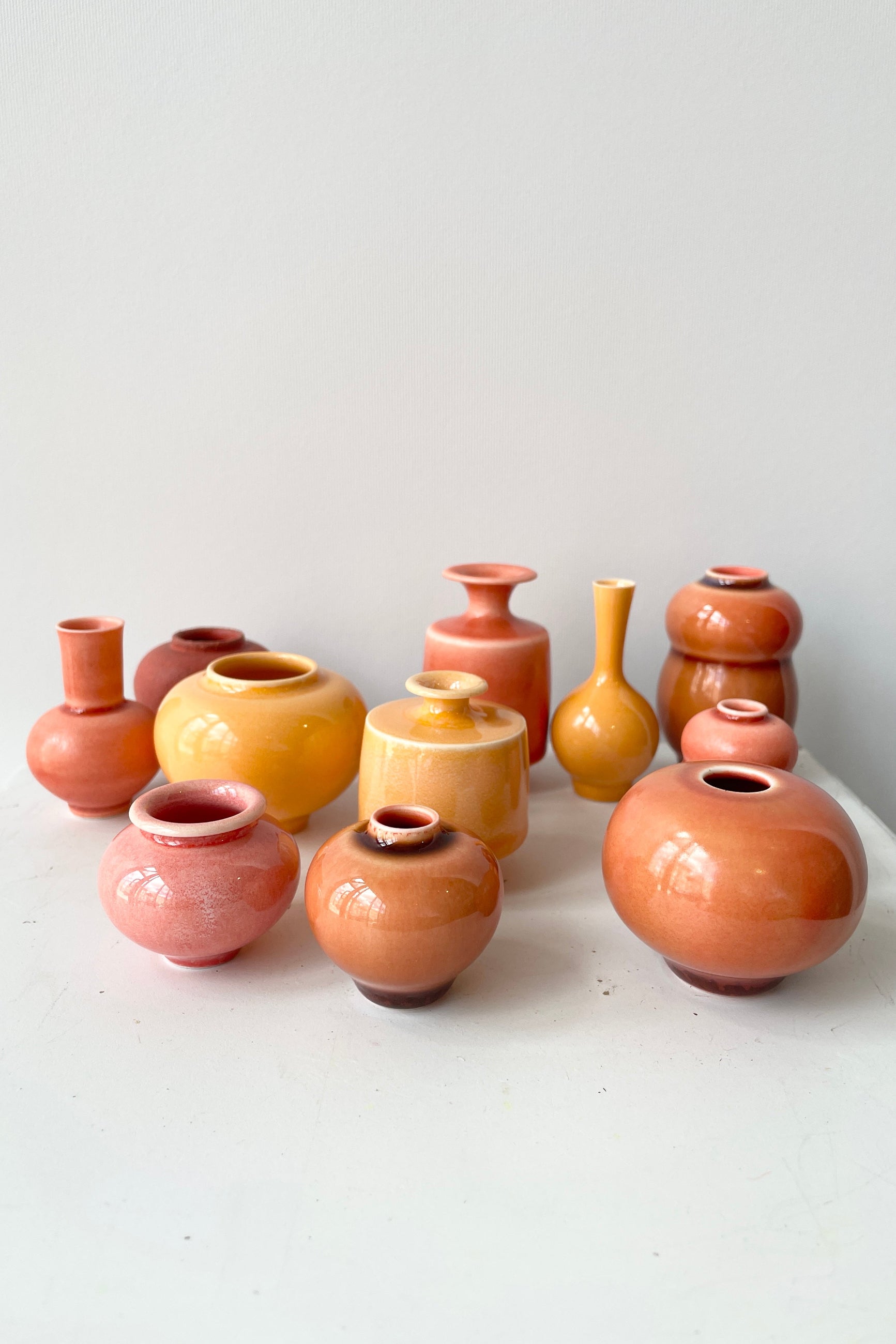 Handmade ceramic vases in orange by Yuta Segawa at Sprout Home. ©Sprout Home