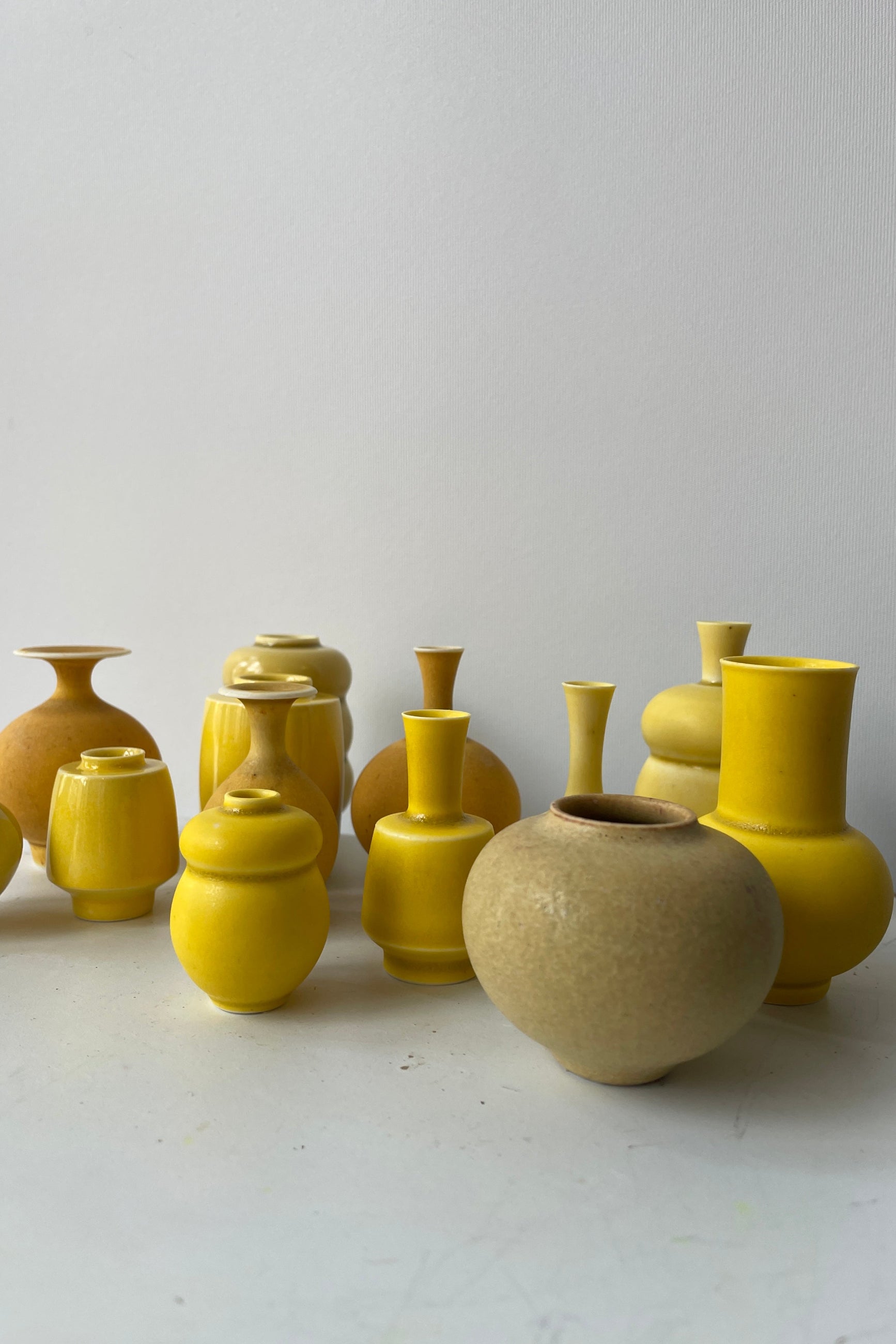Handmade ceramic vases in yellow by Yuta Segawa at Sprout Home. ©Sprout Home