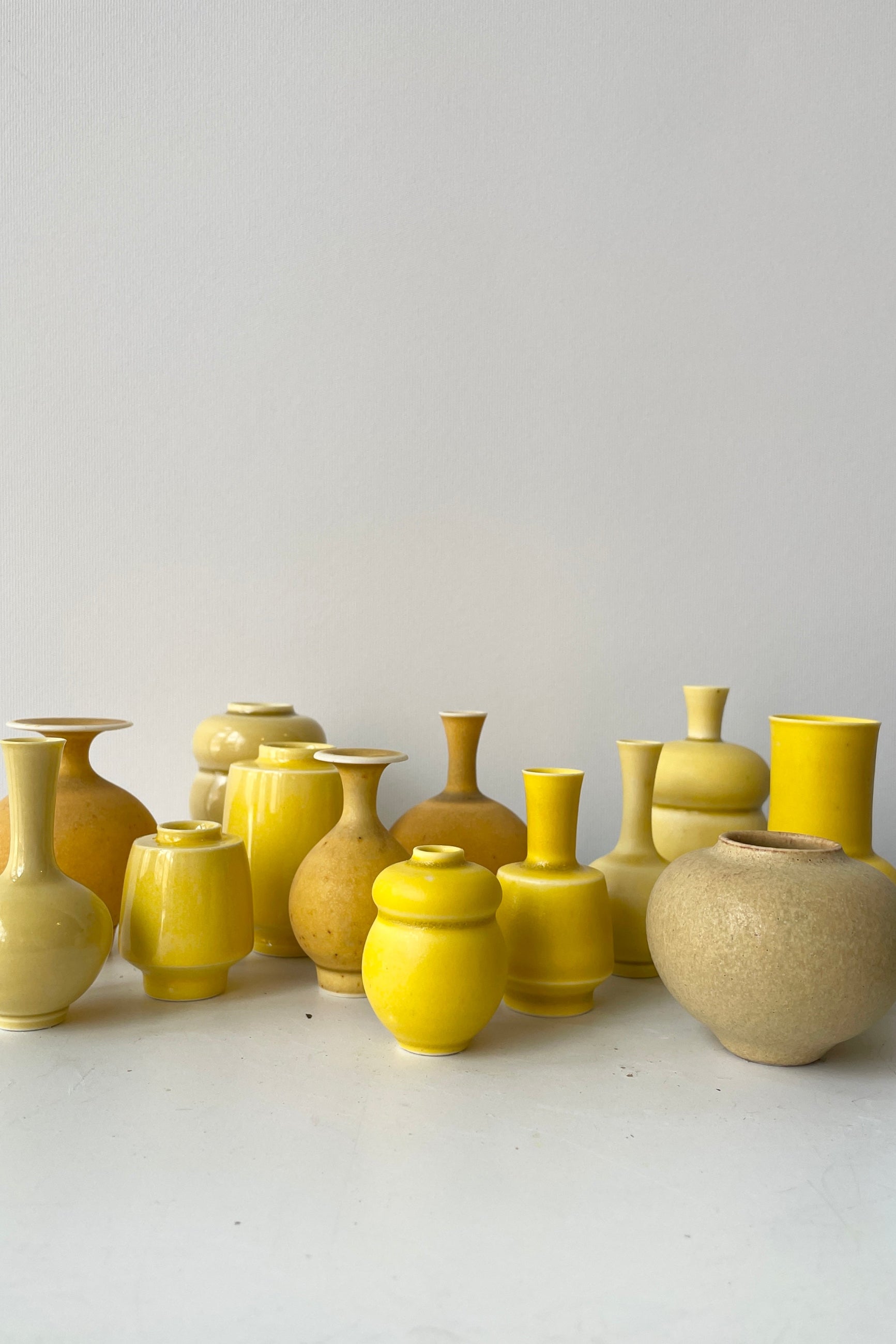 Handmade ceramic vases in yellow by Yuta Segawa at Sprout Home. ©Sprout Home