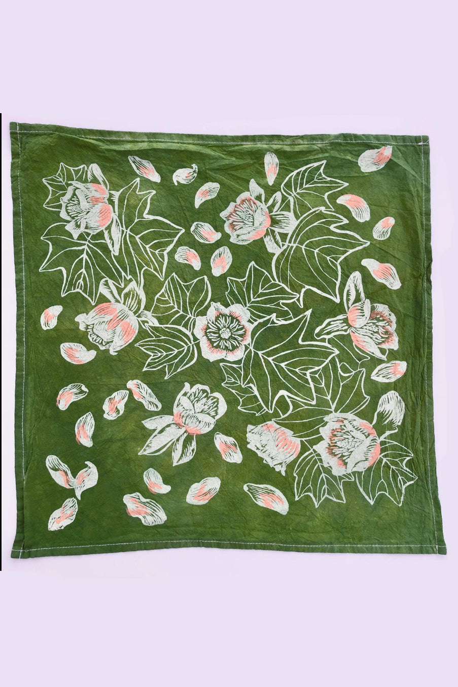 Floral patterned hand printed tulip fabric on a green background ©Solstice Handmade