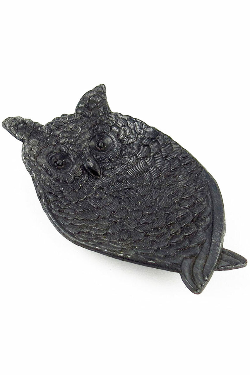 Black owl-shaped object on a white background ©Vagabond Vintage