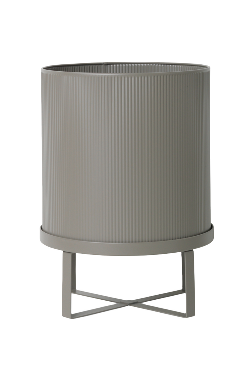 Warm Grey Bau pot by Ferm Living shown empty and from the side spotlighting the vertical ridges.