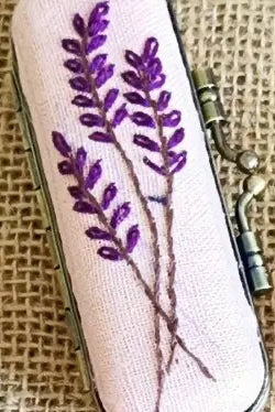 Purple flower lipstick case ©Quince Fables