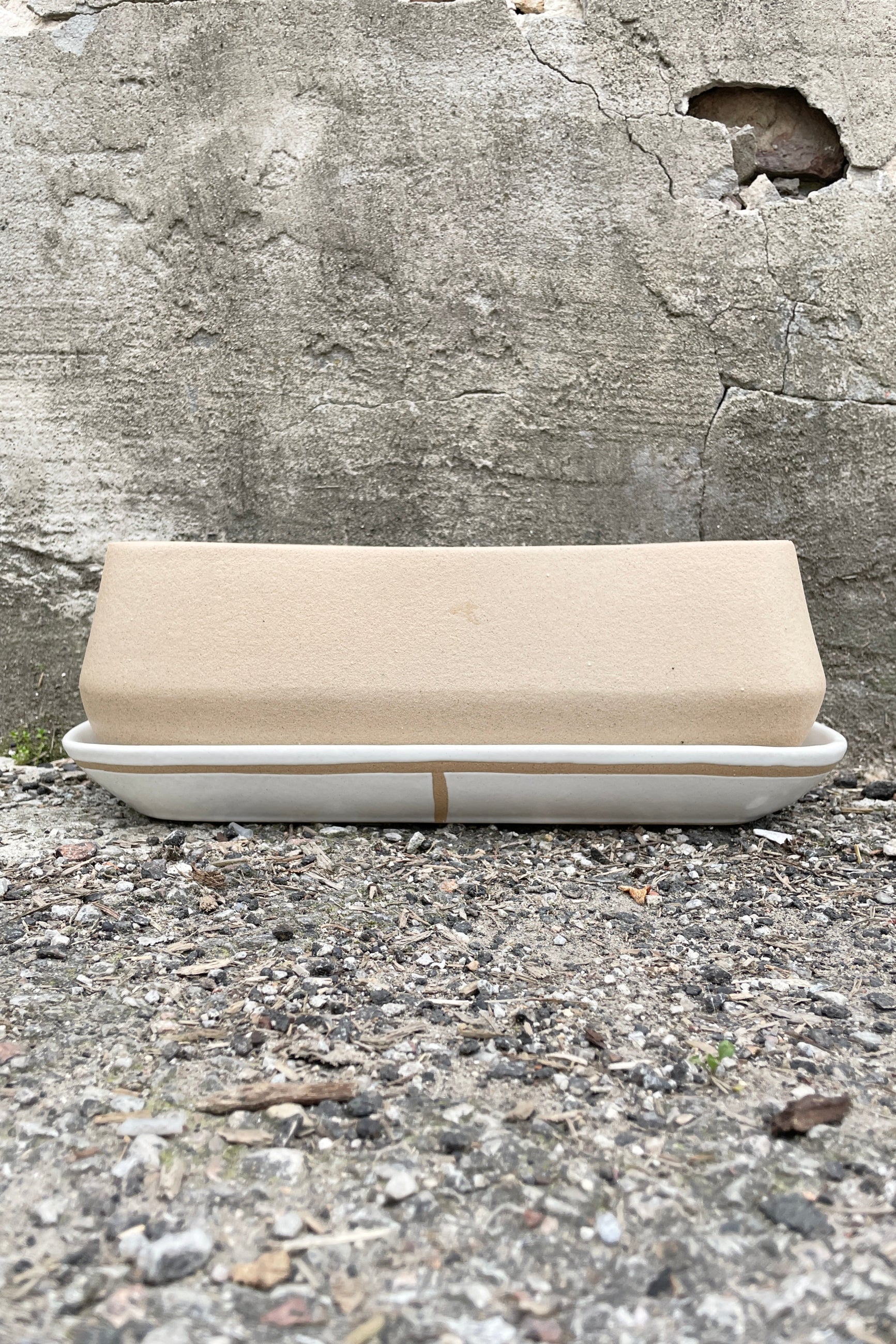 A dublin planter pictured from the side showing the white glaze with design ©Sprout Home
