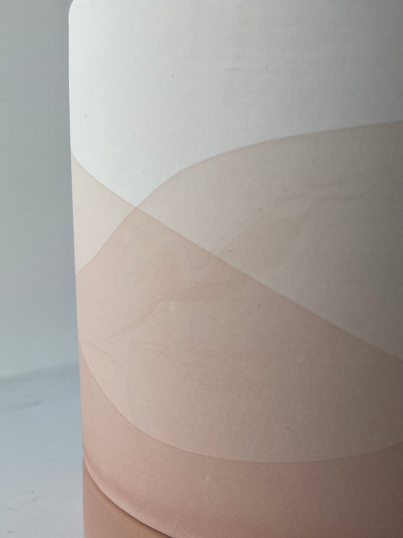 Detail of the vesper pot showing the shades of beige and pink of the design,. 