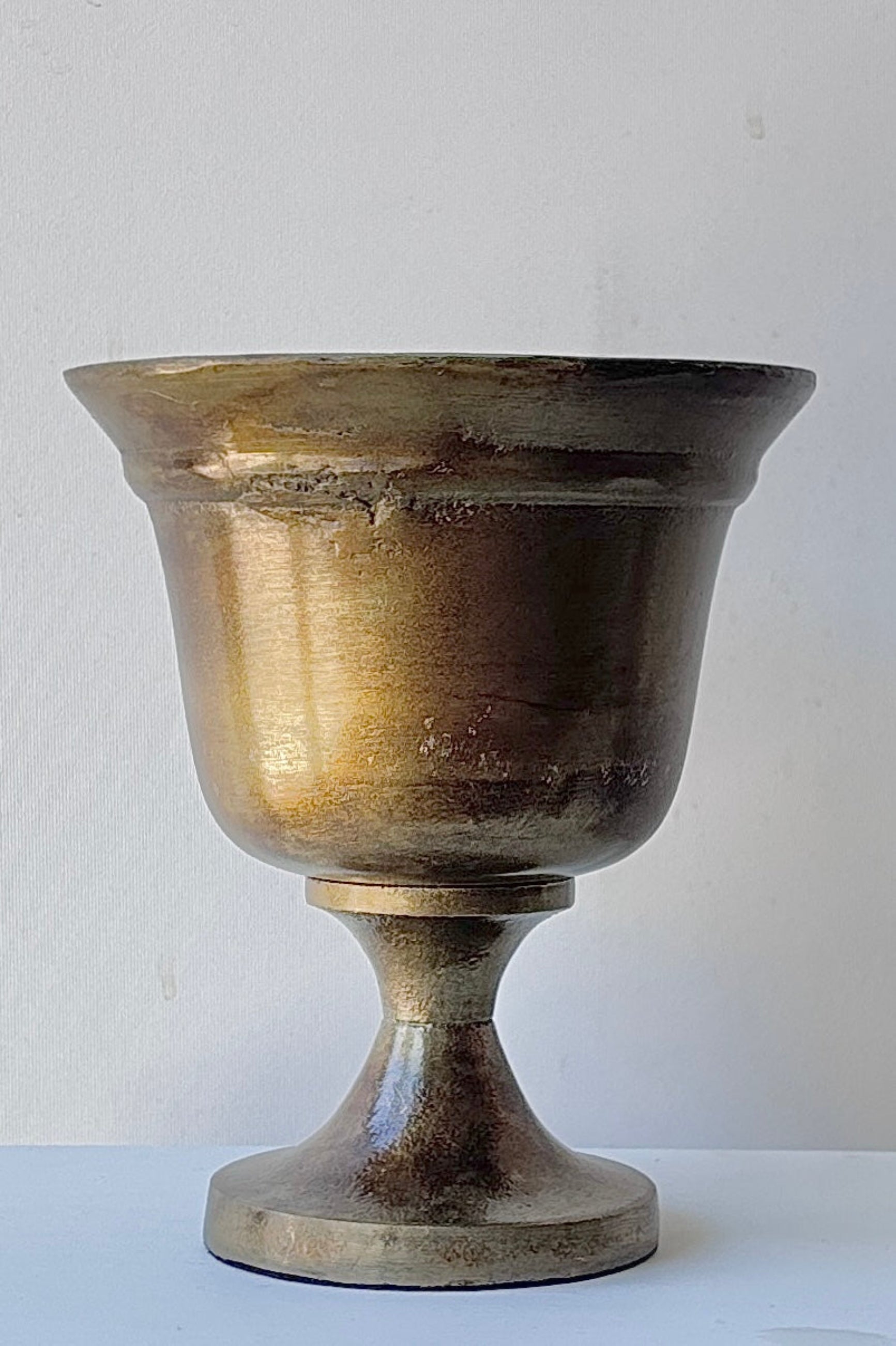 Bronze-colored Helen goblet on a white background ©Sprout Home