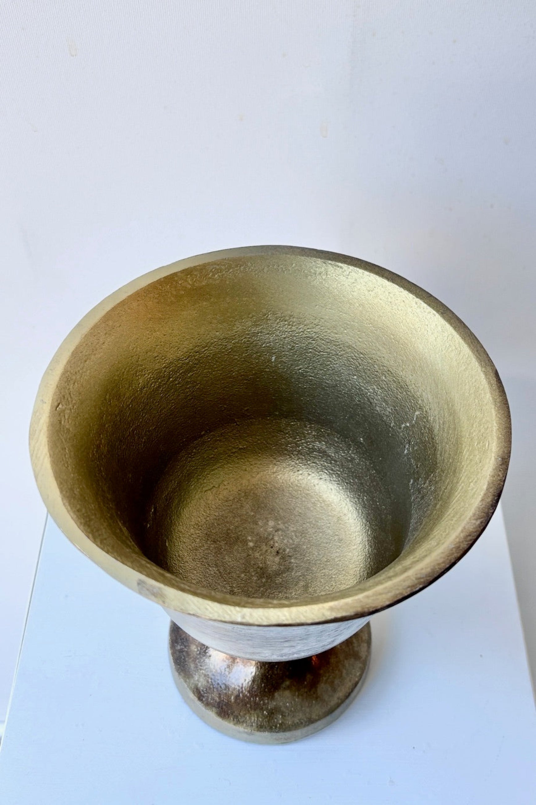 Top view of bronze-colored Helen goblet on a white background ©Sprout Home 