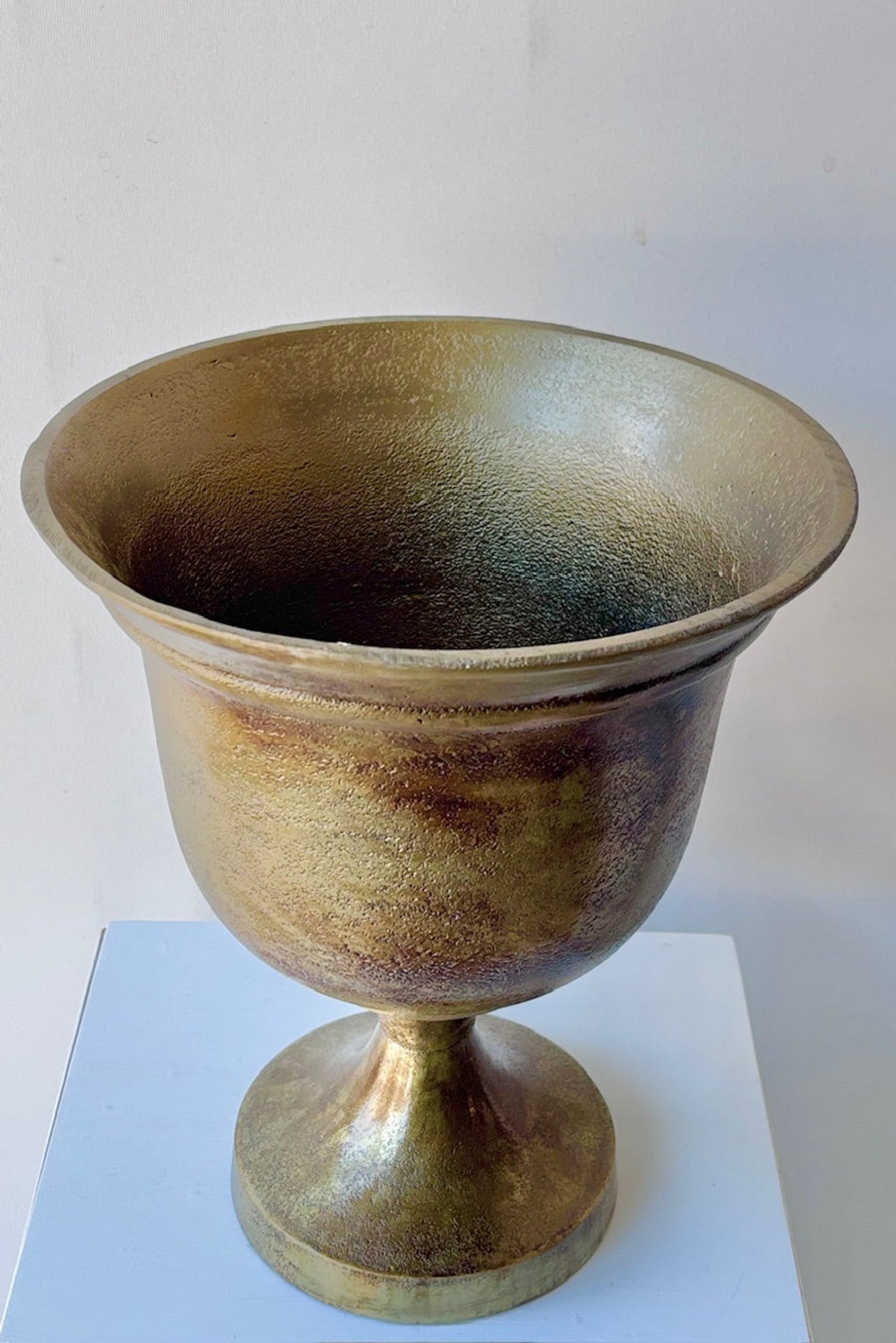 Top view of Hullen Bronze urn on a white background ©Sprout Home