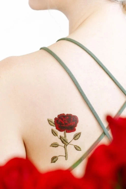 Stitched Rose Tattoo by Tattly on a woman's back