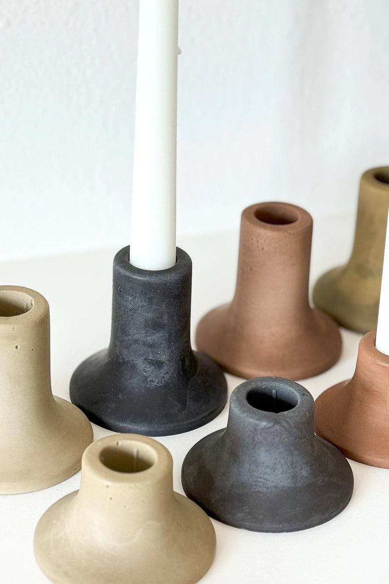 Mina Tall Taper Candle Holders in various colors on a white background ©Sunday Nomad