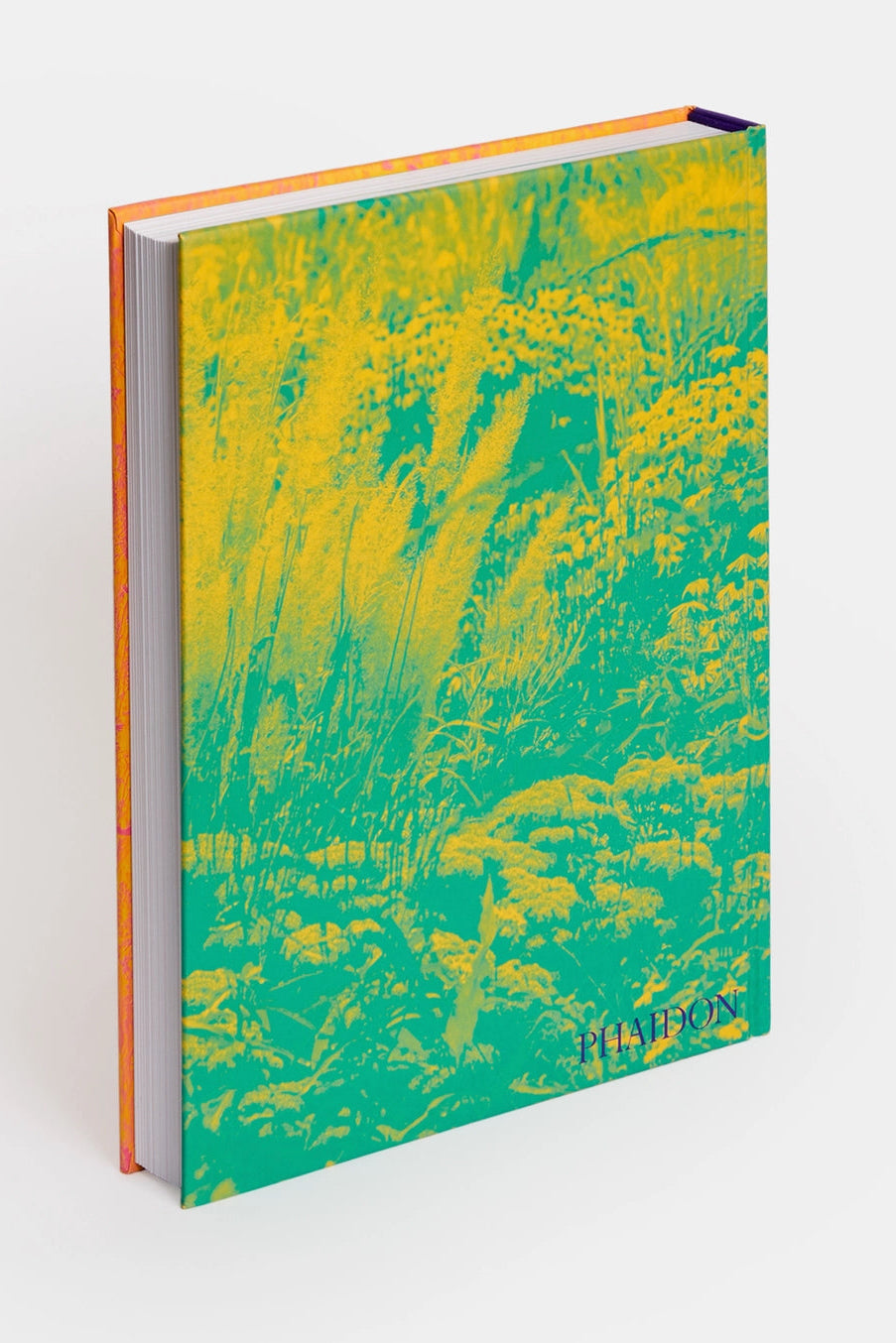 the back of Wild: the Naturalistic Garden book  with a green and yellow abstract design on a white background ©Phaidon