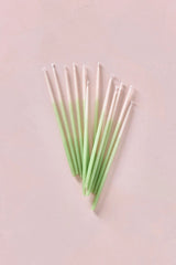 Knot & Bow tall Mint Ombre beeswax candles fanned out.