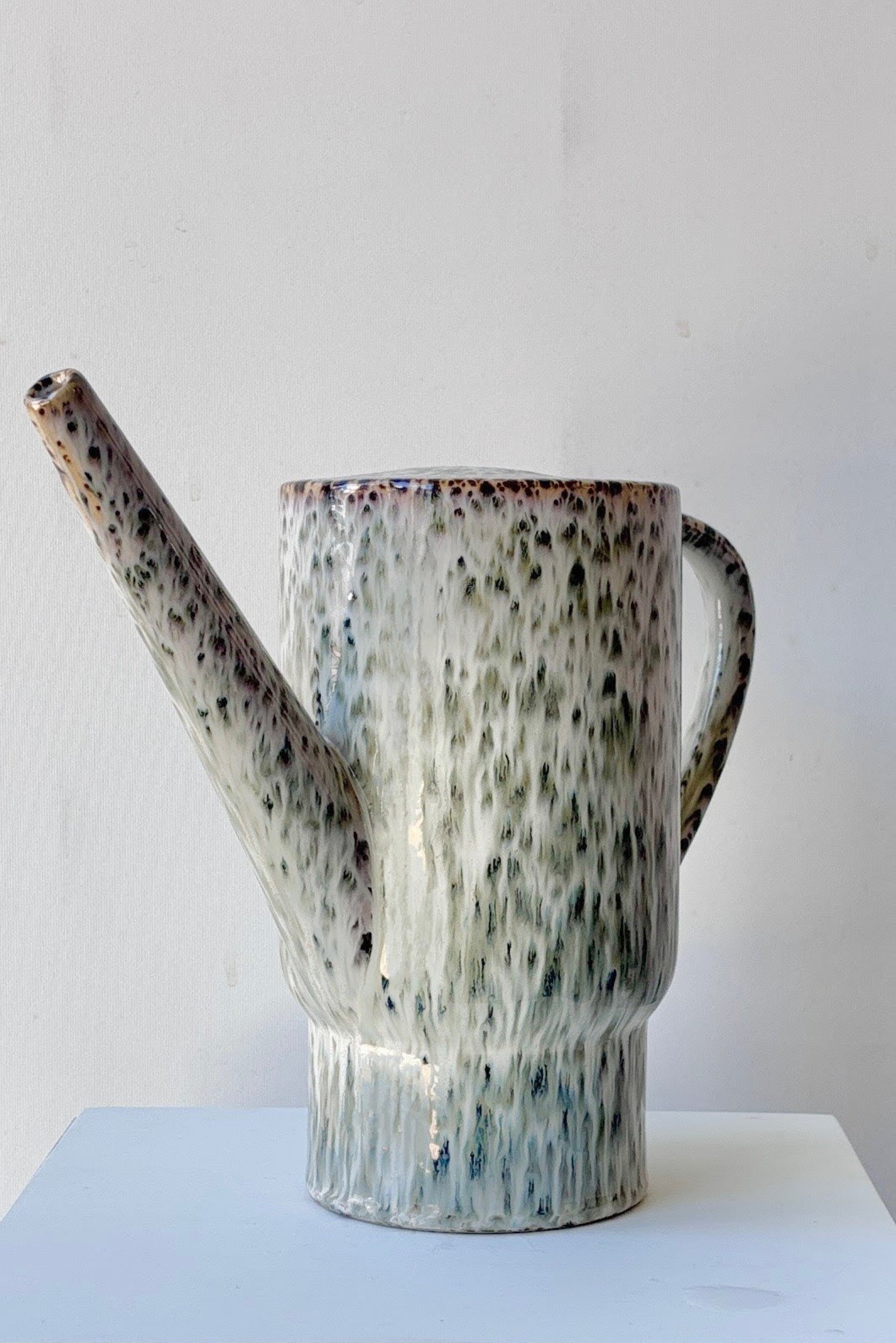Ceramic Lucien pitcher with speckled pattern on a white background ©Sprout Home