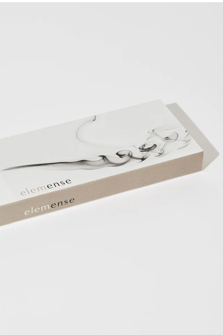 A white box of incense with black detial printed on the package in front of a white wall ©Nippon Kodo