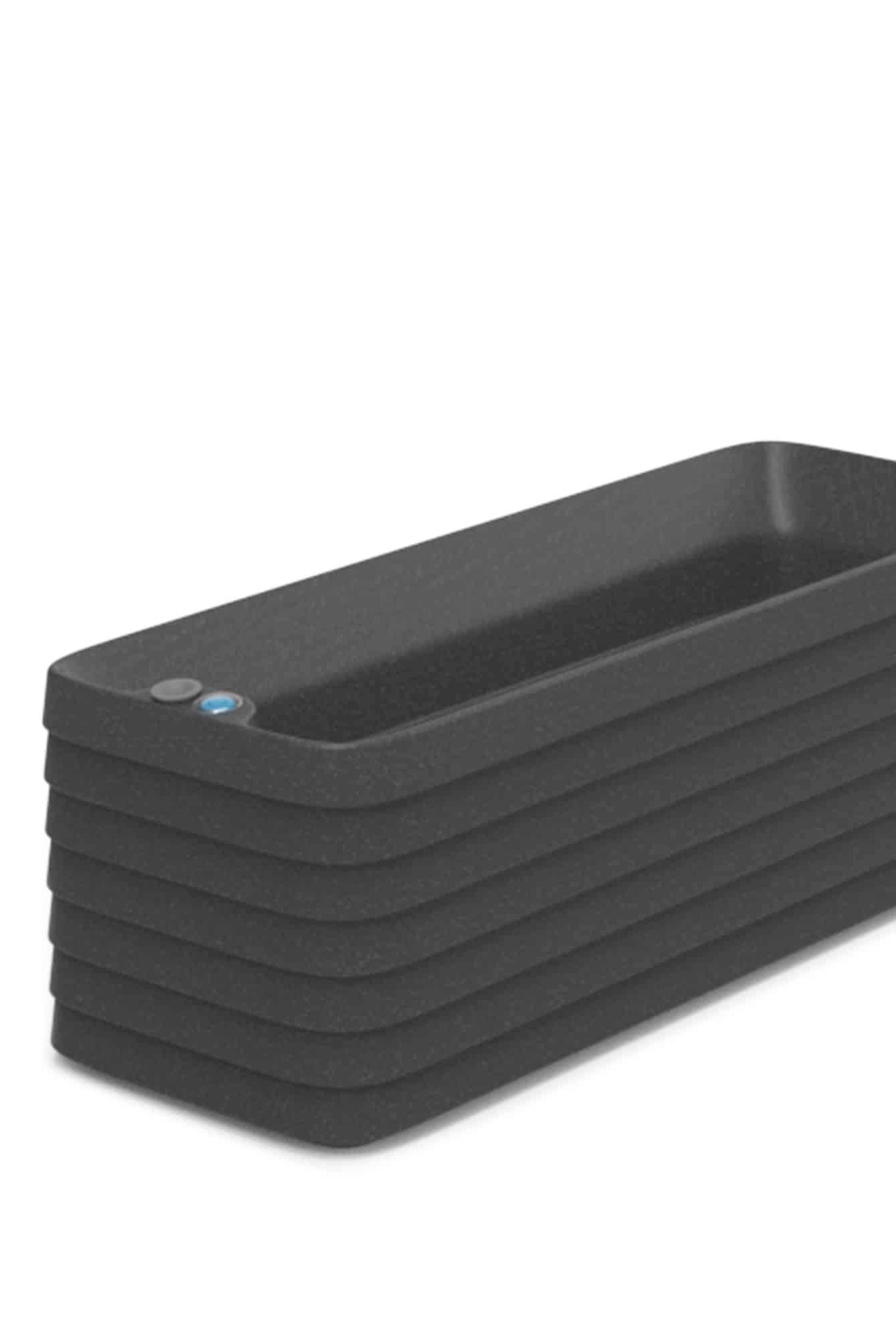 Stack of black rectangular containers on a white background ©Crescent