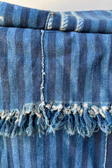 Indigo Tie-dye bud cloth showing the tassels 