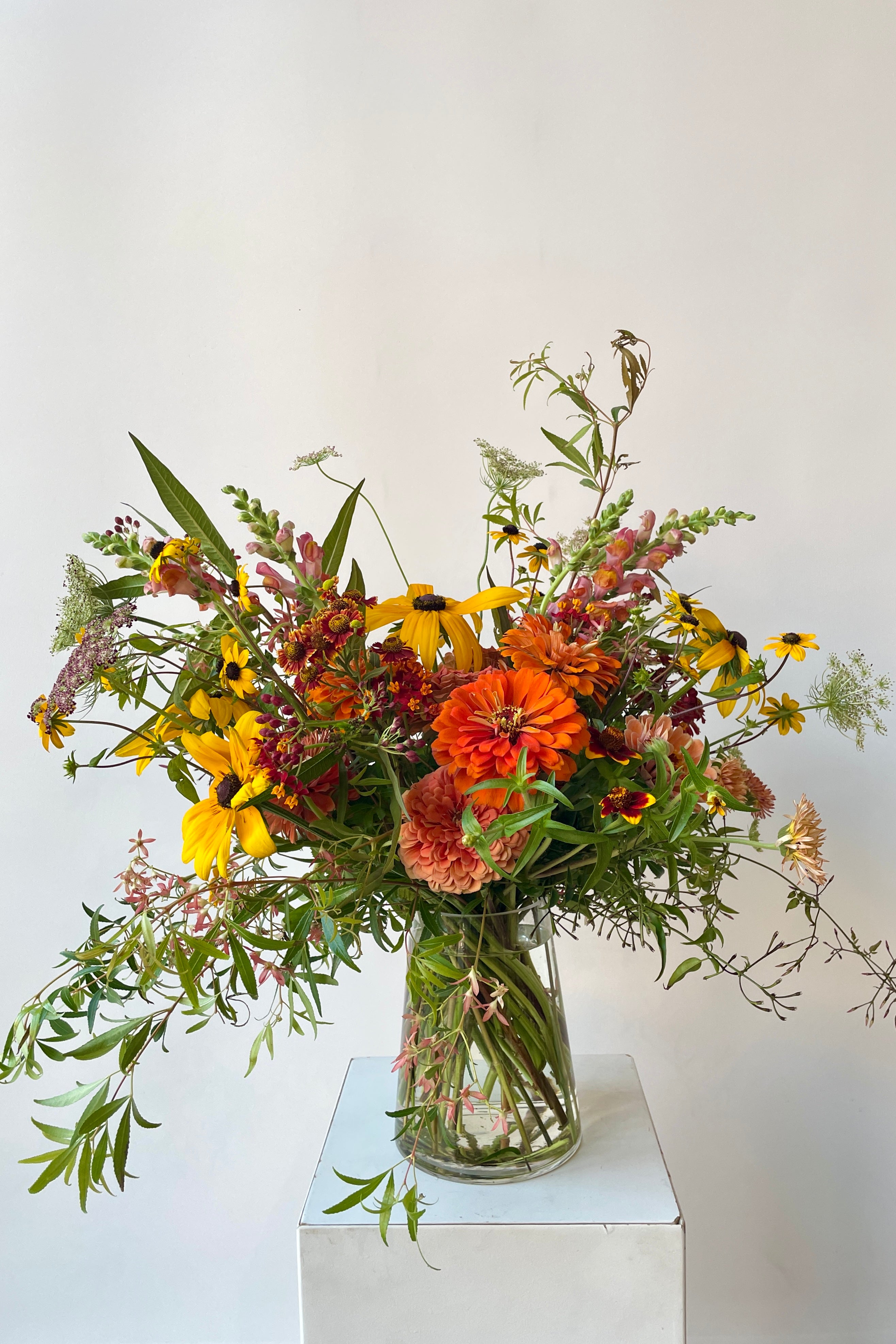 An August custom Earth arrangement by Sprout Home featuring Zinnia's #size_$160