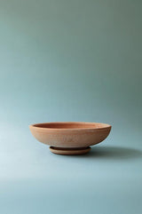 a Ada Raw Bowl from Bergs Potter empty with a light blue background