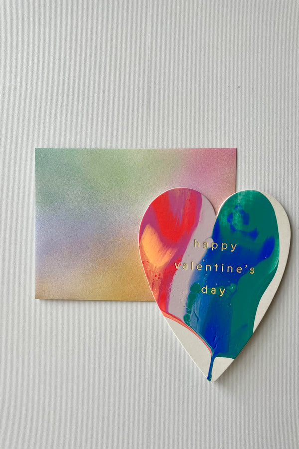 Photo of heart shape Sunset Valentine Card and envelope in a white room