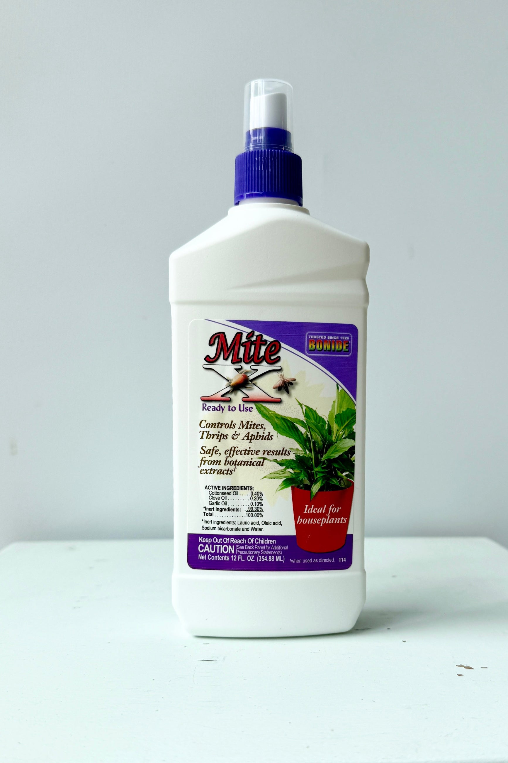Bonide Mite killer bottle shown from the front on a white backdrop. ©Sprout Home