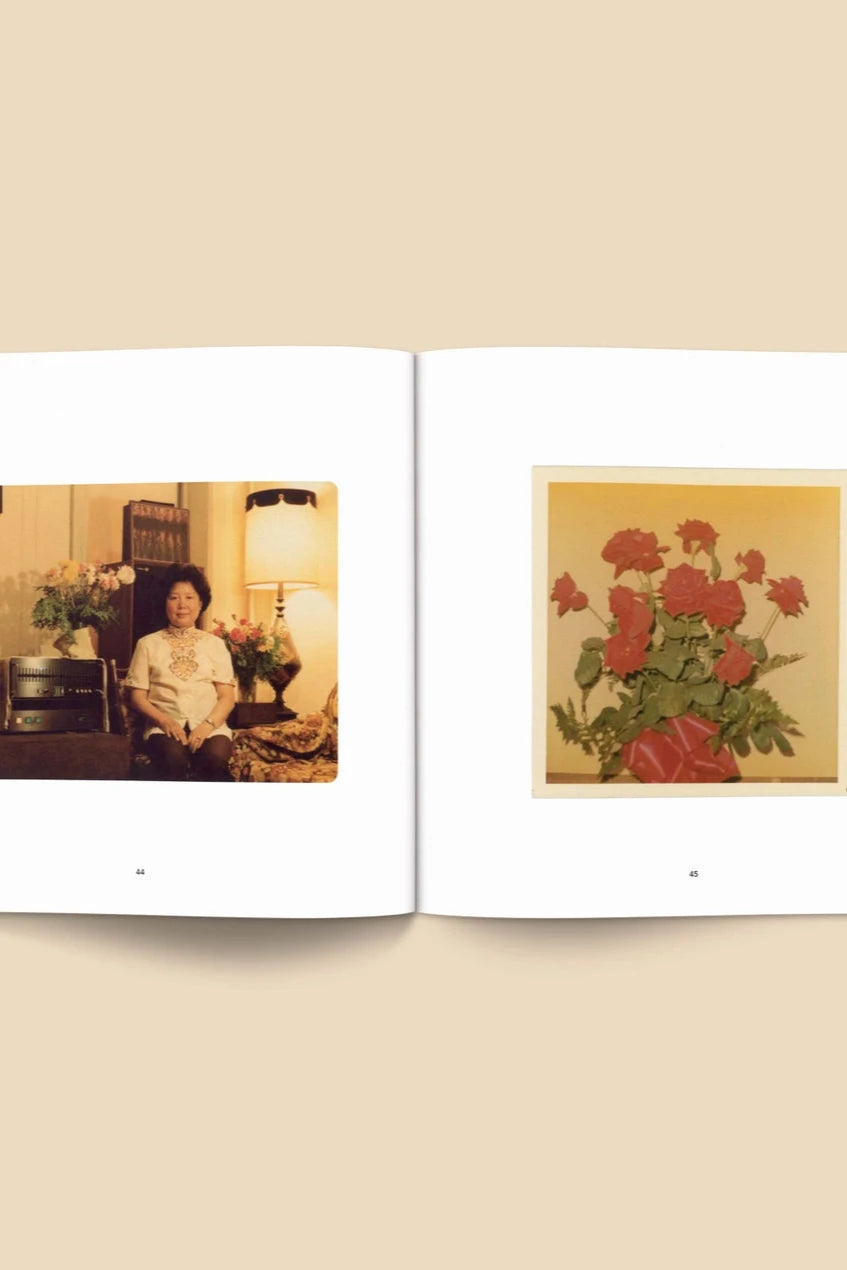 Forgotten Flowers Coffee Table Book by Broccoli  open to a page with vintage photos