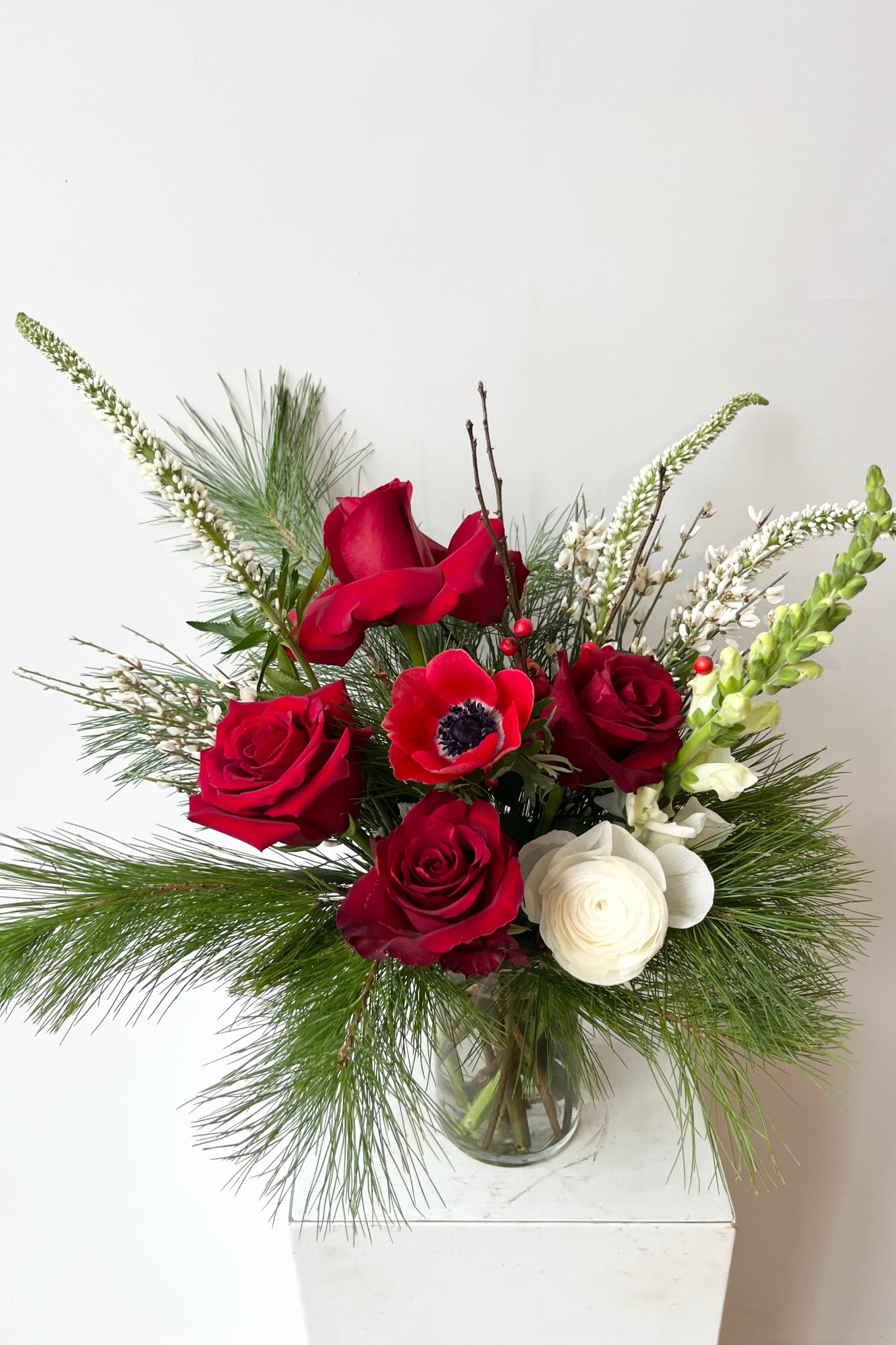 A hand holds an example of fresh Floral Arrangement Solstice from Sprout Home Floral in Chicago ©Sprout Home #size_$75
