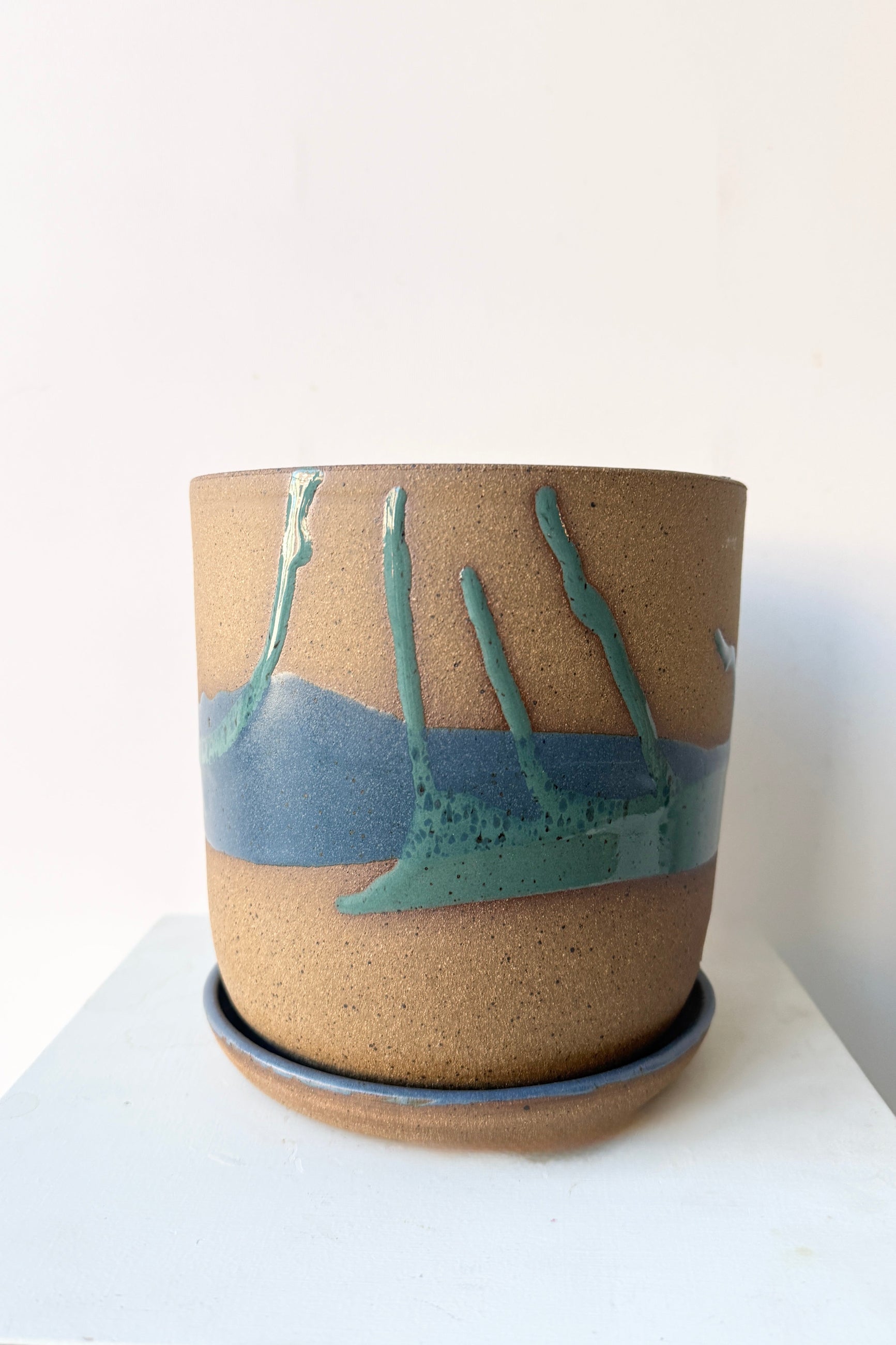 Cylinder Pot & Saucer Denim and Dark Teal Splash Glaze 6.5" with abstract design by Christina Kosinski on a white background ©Sprout Home