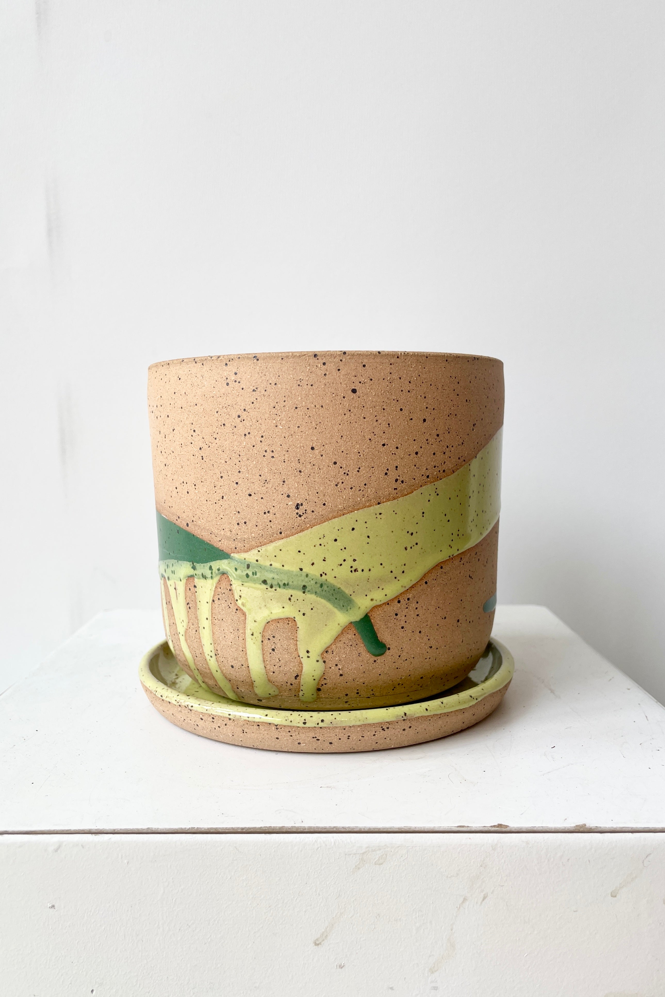 The Green Splash Cylinder pot and saucer handmade by Christina Kosinski at Sprout Home