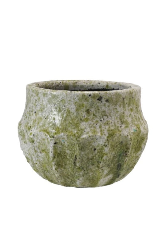 A green terrazzo finish pot in a white room ©Sprout Home