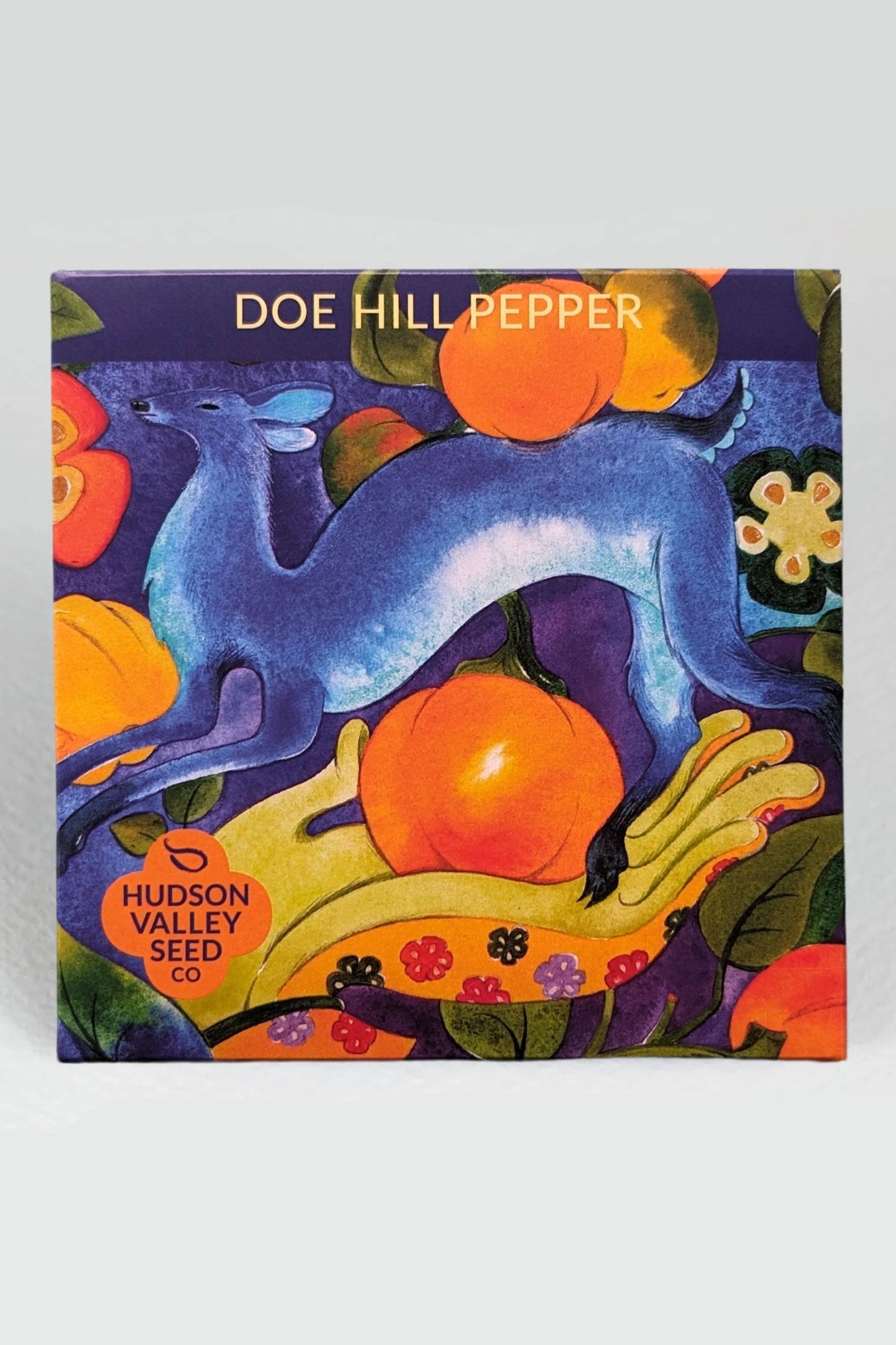 Colorful seed packet with kangaroo and pumpkins design, featuring 'Doe Hill Pepper' and 'Hudson Valley Seed Co.' ©Hudson Valley Seed Co.
