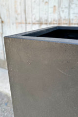 The Yang Fiberstone pot showing the detail of the finish on its corner. 