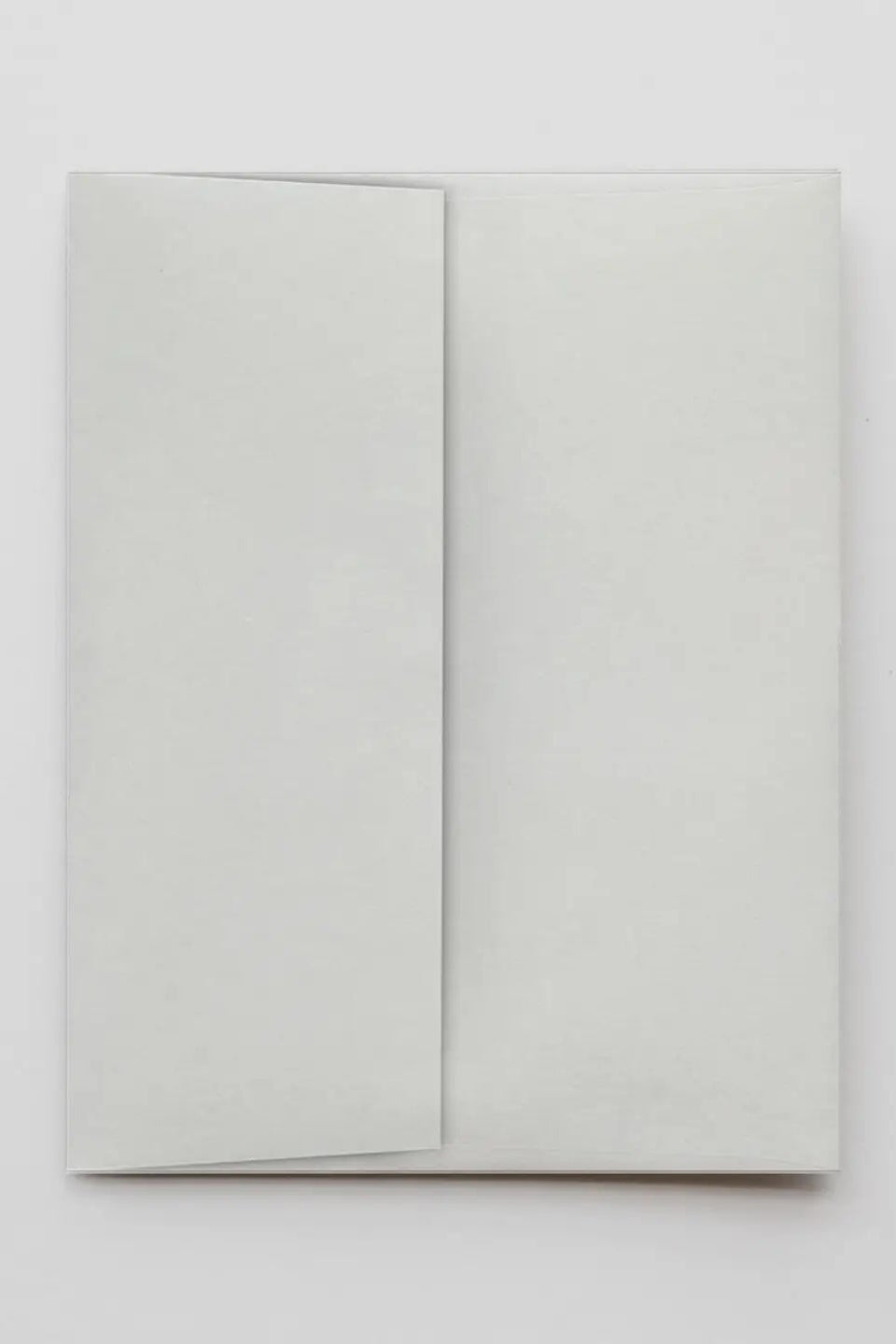 A white paper envelope on a white background ©Hammerpress
