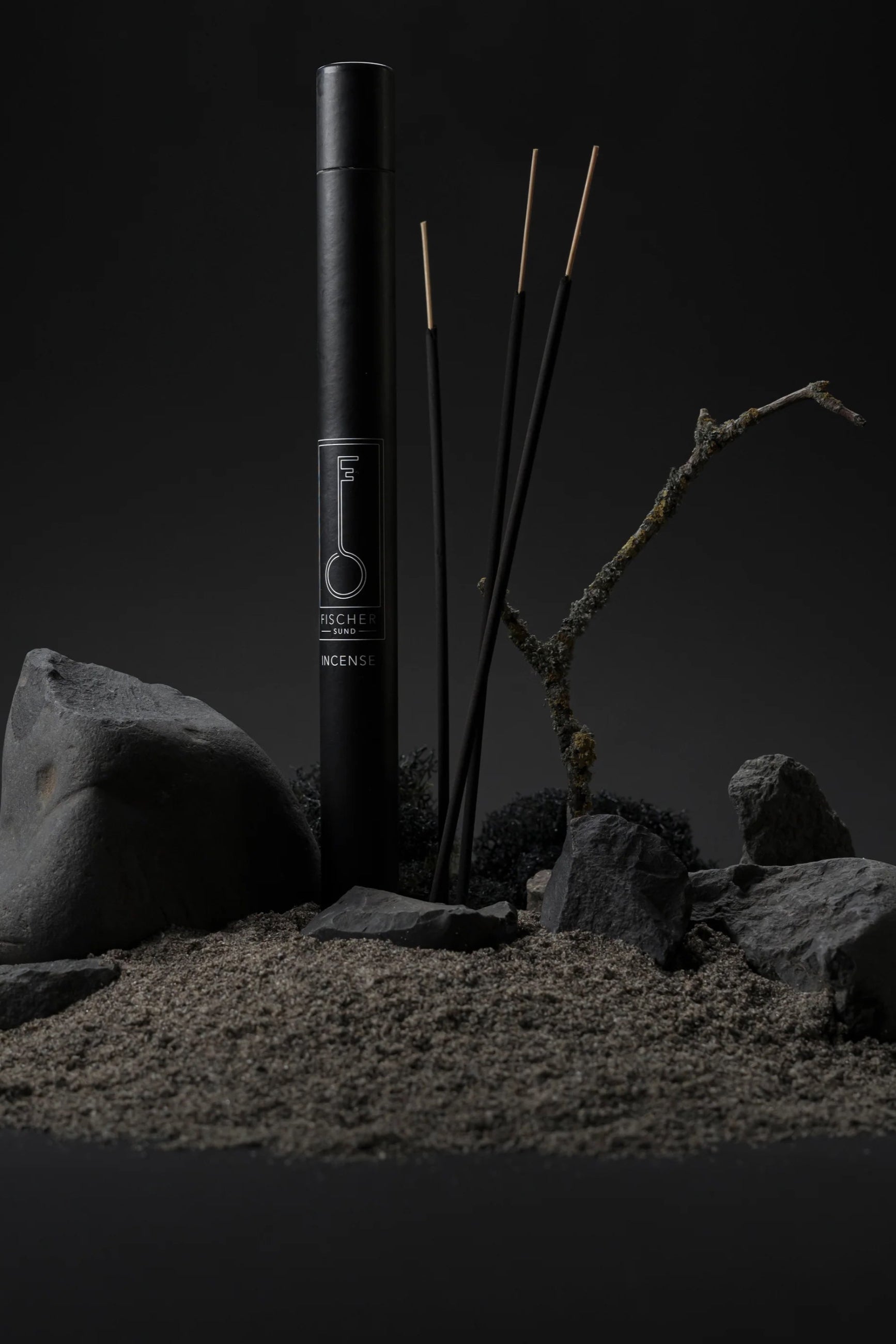 Fischersund Incense Sticks with sticks and rocks on a dark background ©Fischersund