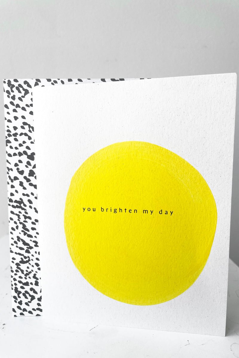 A full frontal view of Brighten My Day Card and envelope against white backdrop