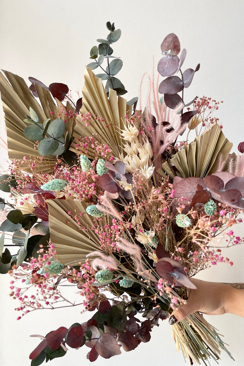 A detail picture of 'Faerie' preserved floral arrangement showing the various textures of preserved floral in pastel shades. 